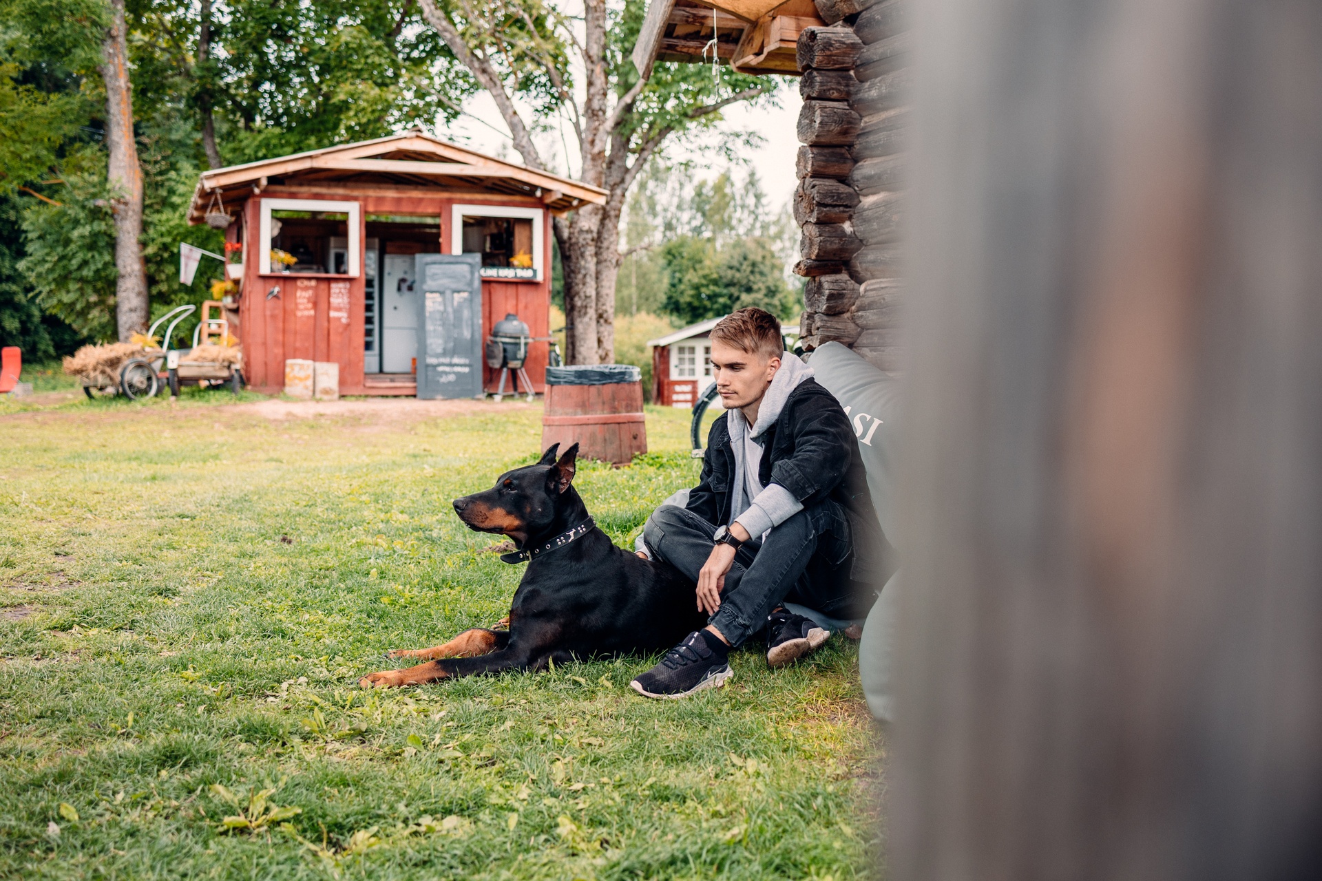 man sitting with a dog 
