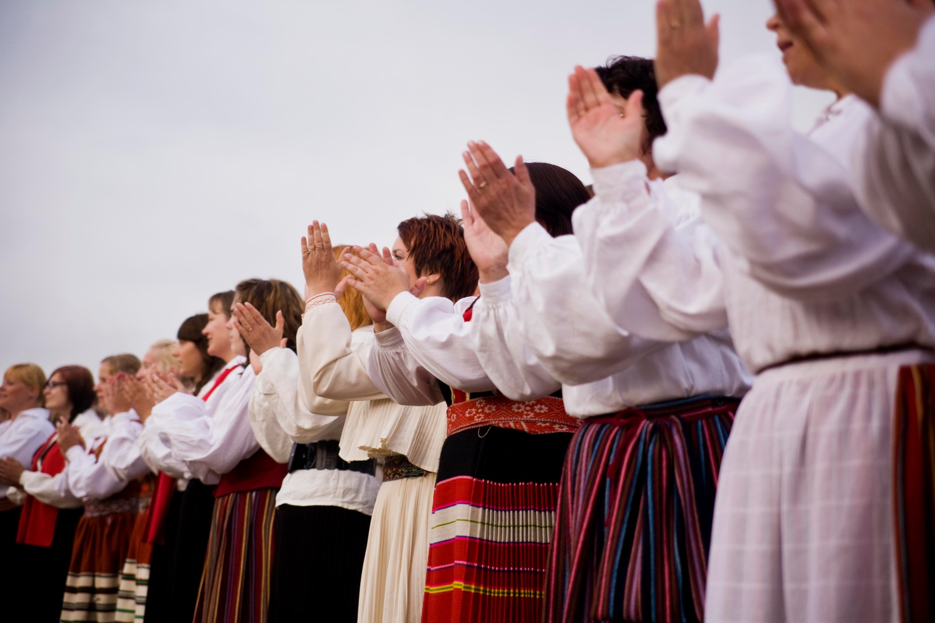 Women in traditional Estonian dress at the Song Festival