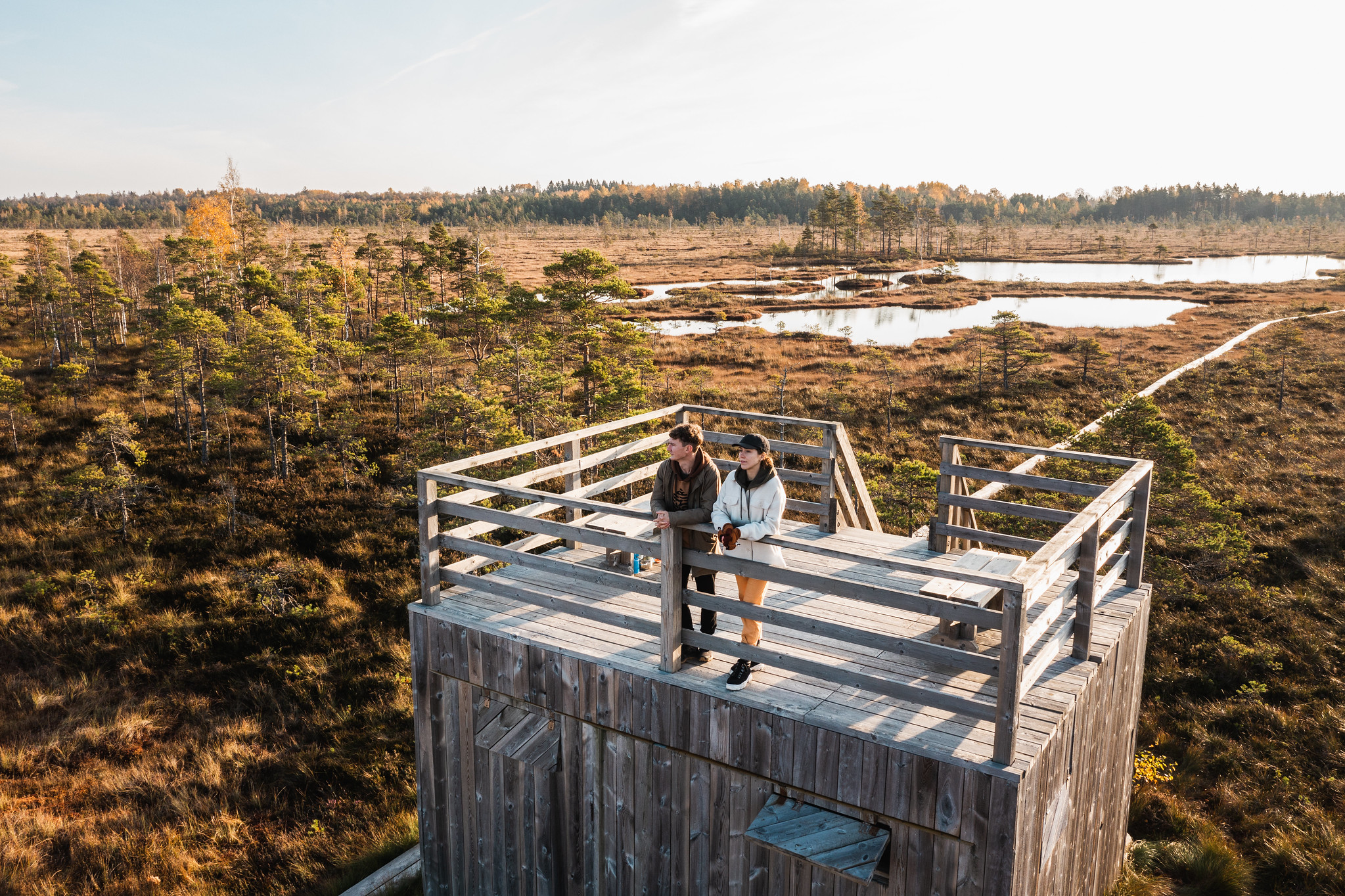 Two hikers on the wooden tower on the Nigula Bog trail