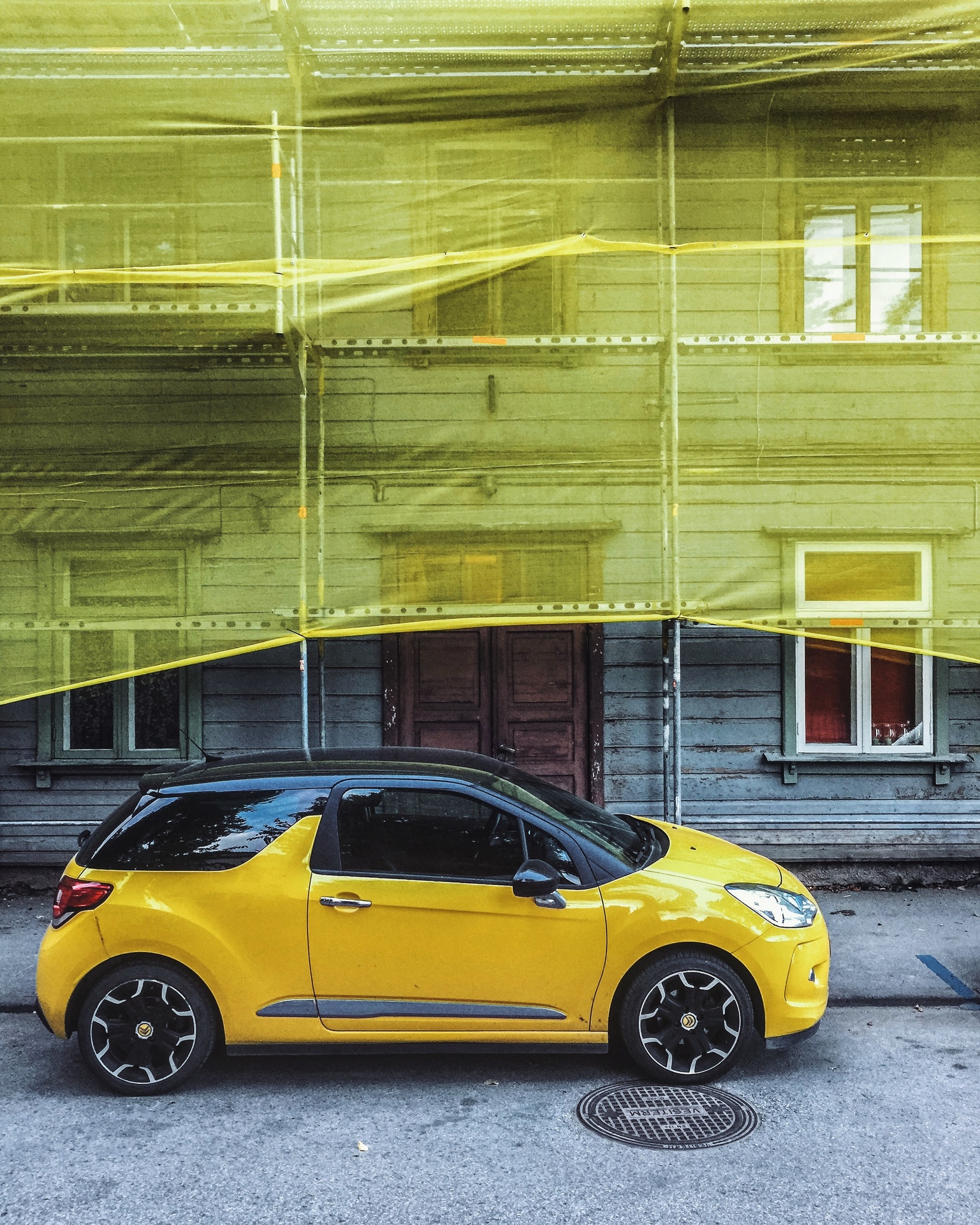 yellow car in the street