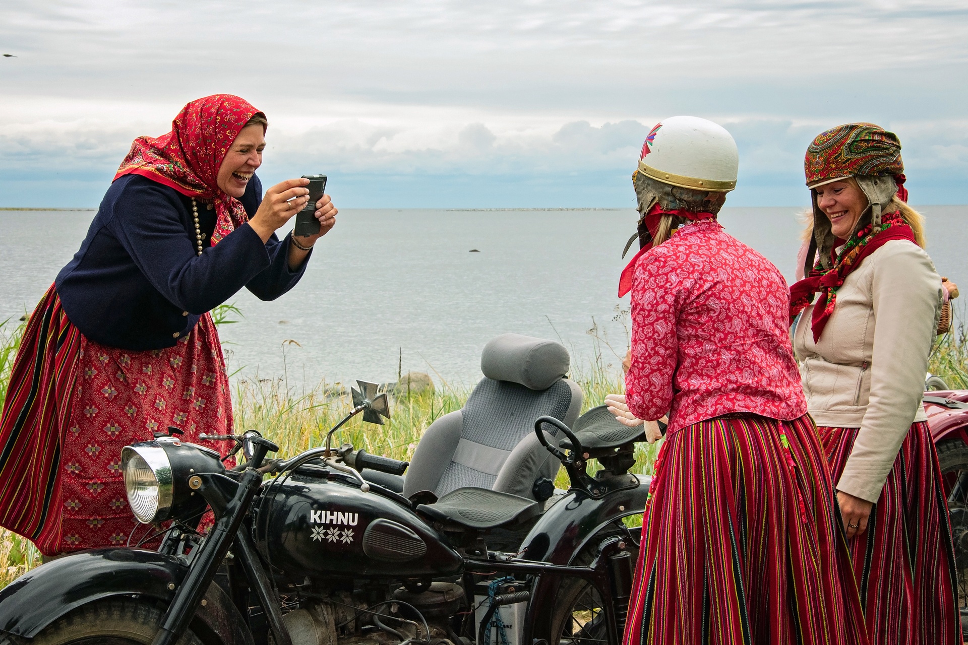 Kihnu women and motorcycle