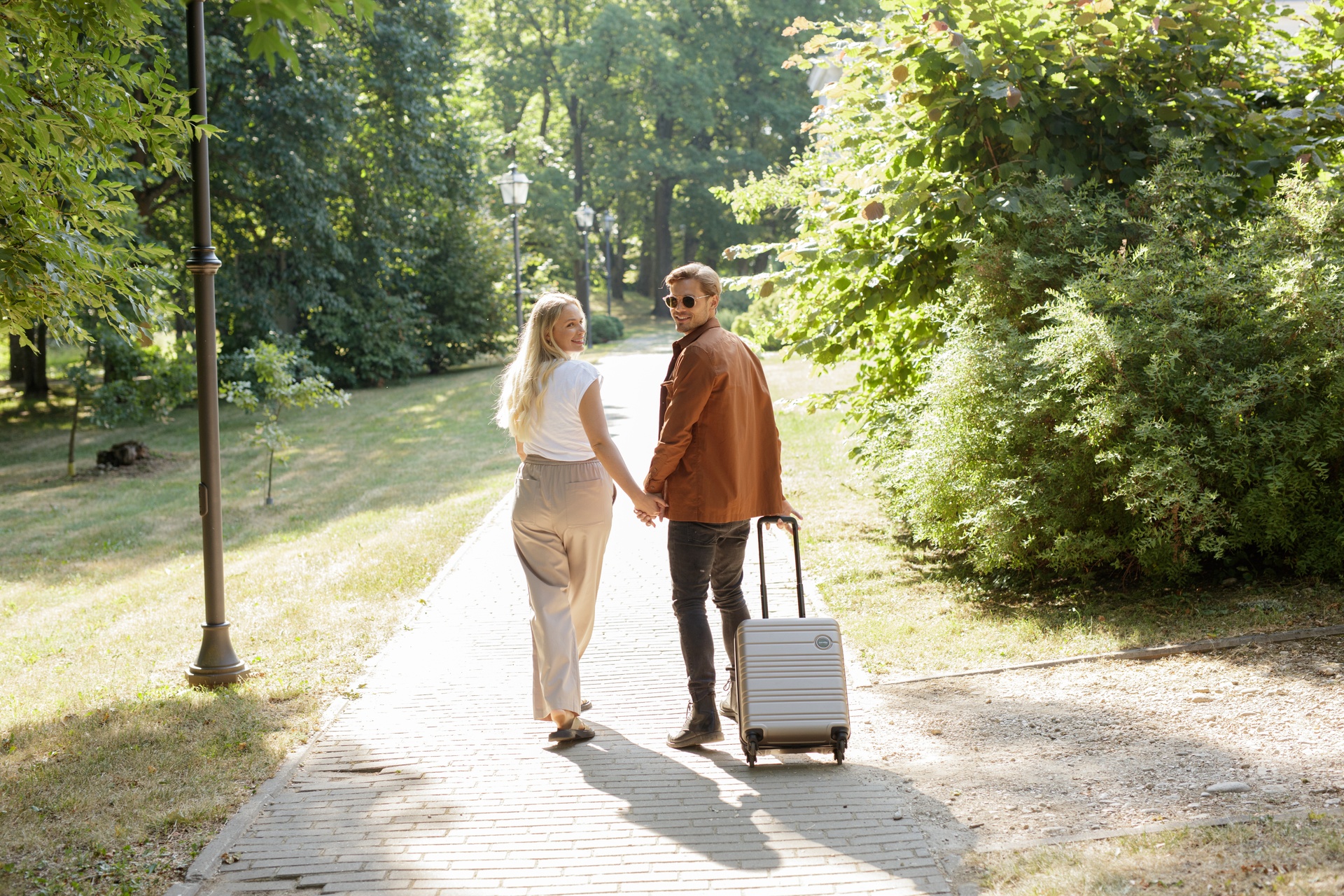 a couple with a travel luggage