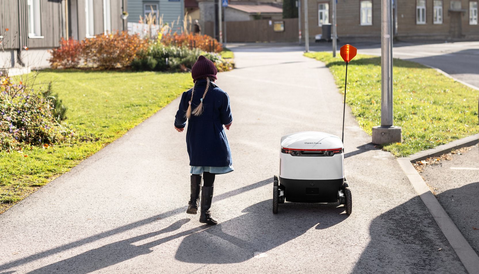 Kid and a delivery robot