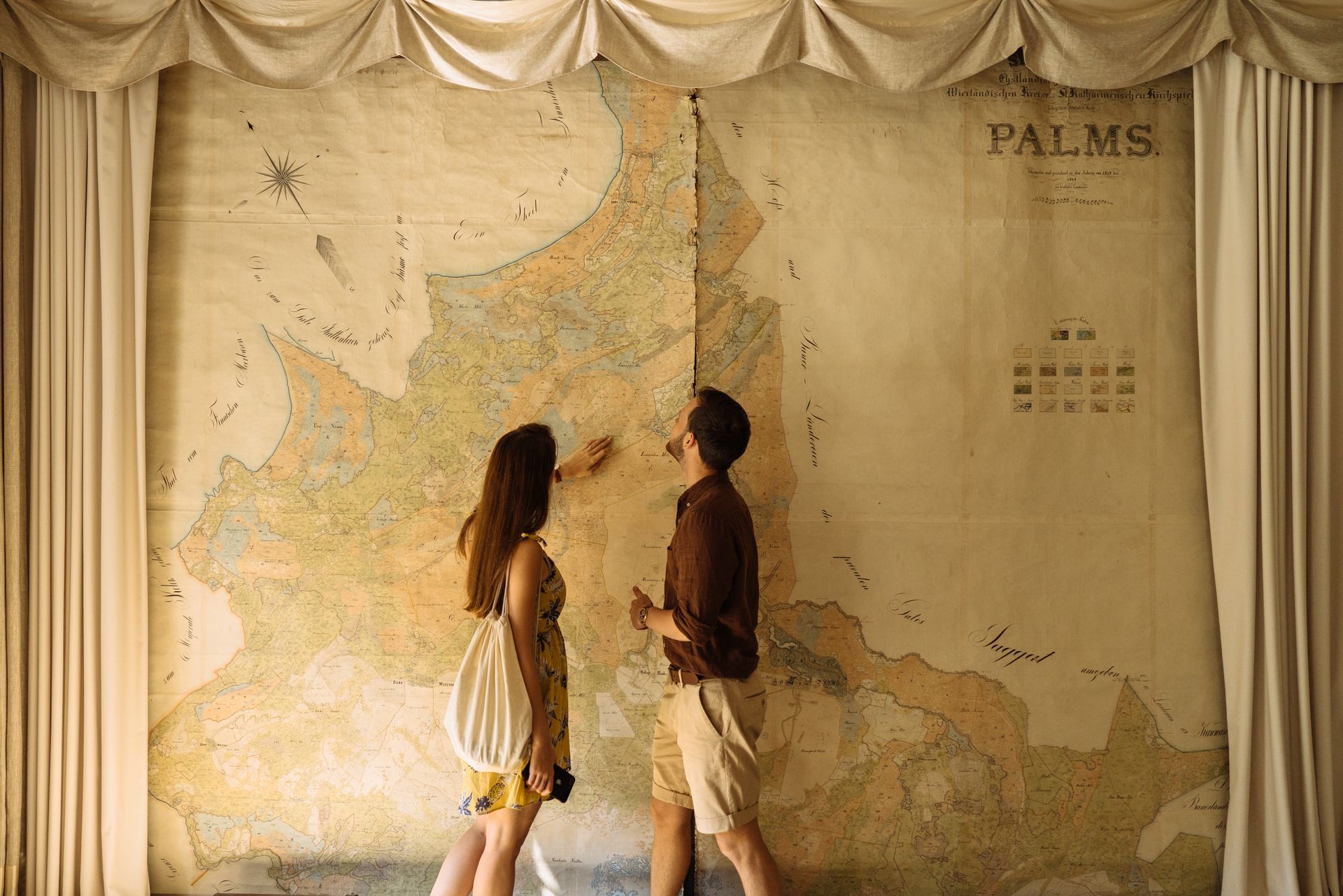 Couple in front of the map