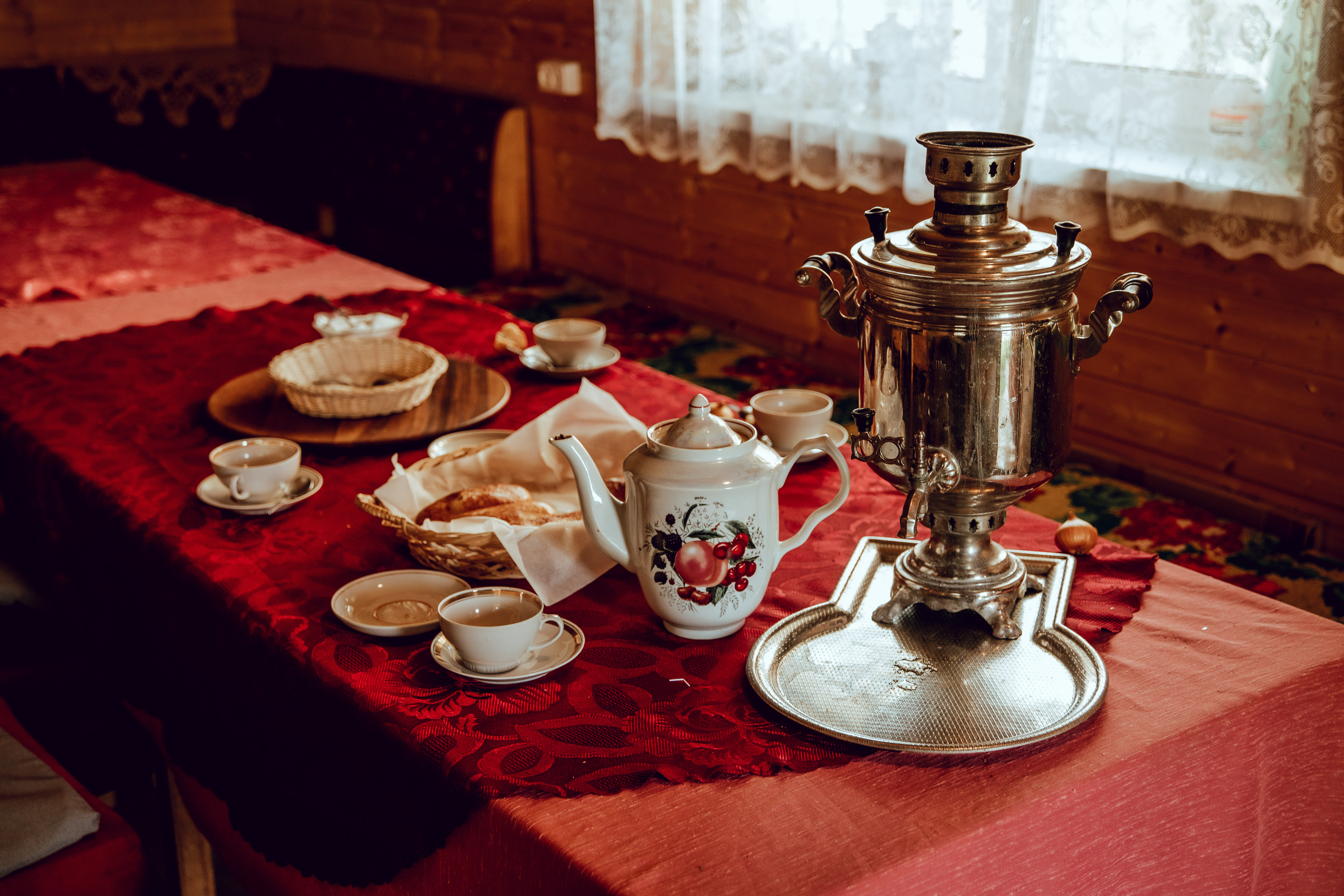 Tea time with a samovar and snacks in Old Believer's house