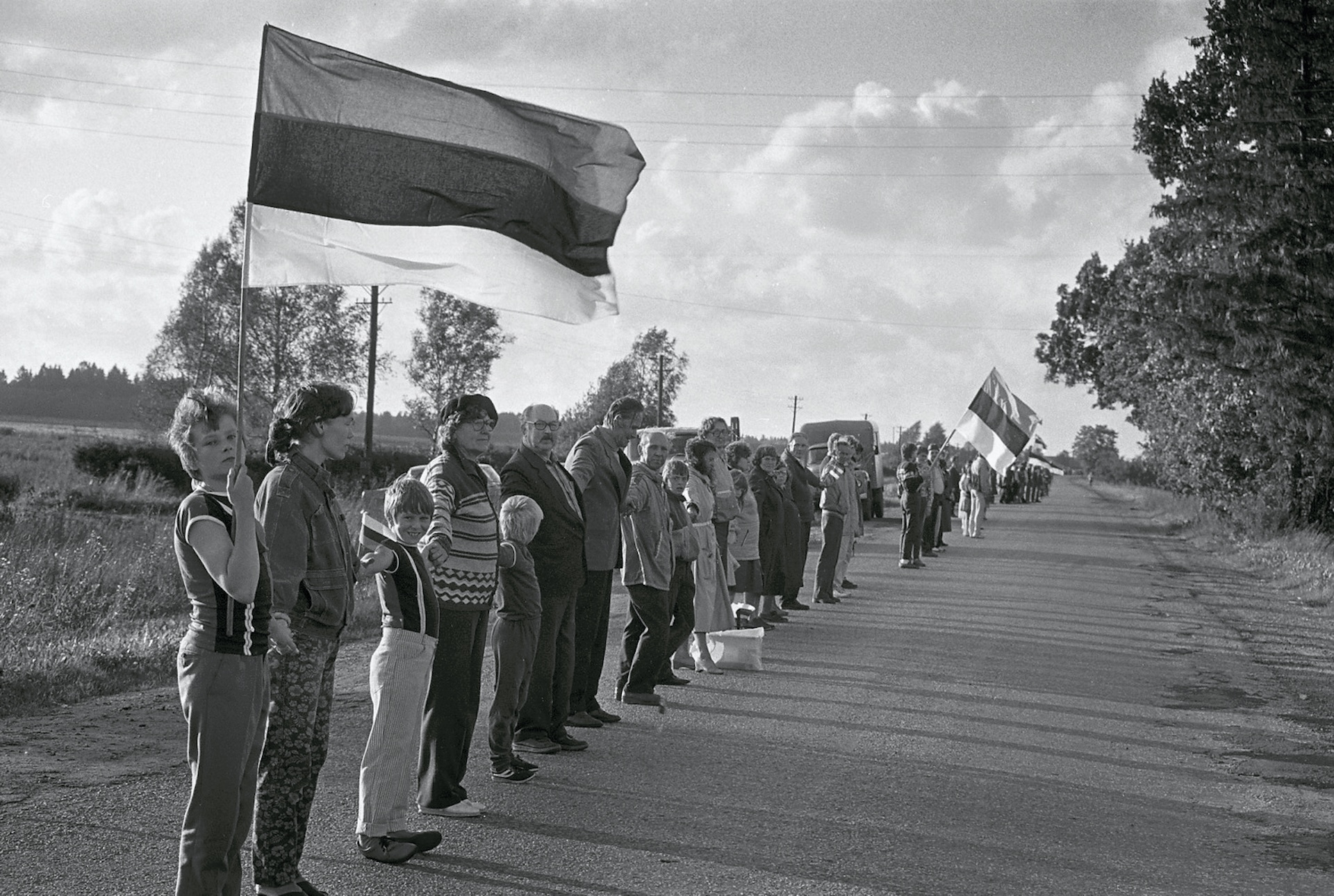 People lined up along a road in Estonia, Baltic Chain