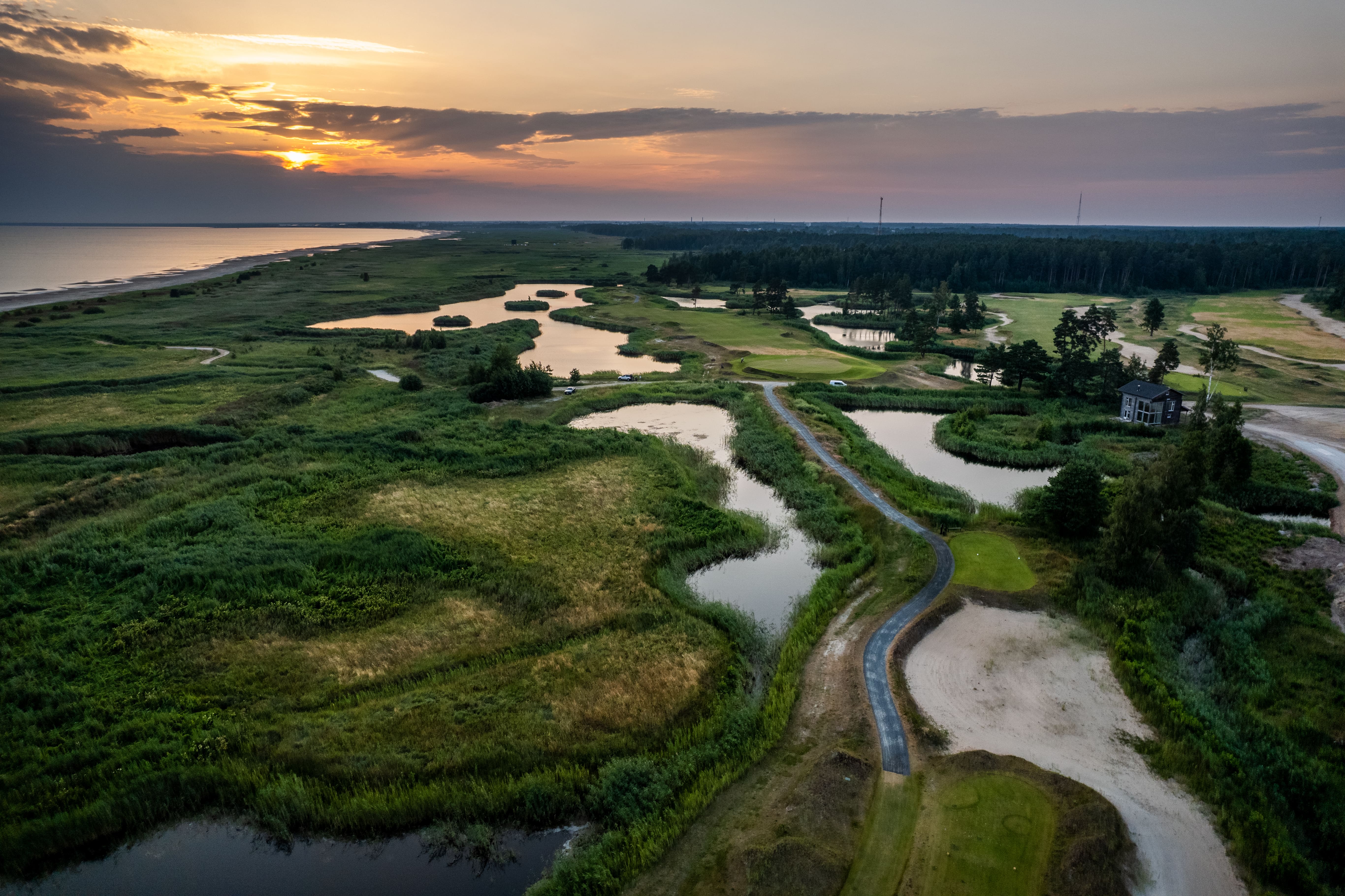 Pärnu Bay Golf Links at sunset during summer