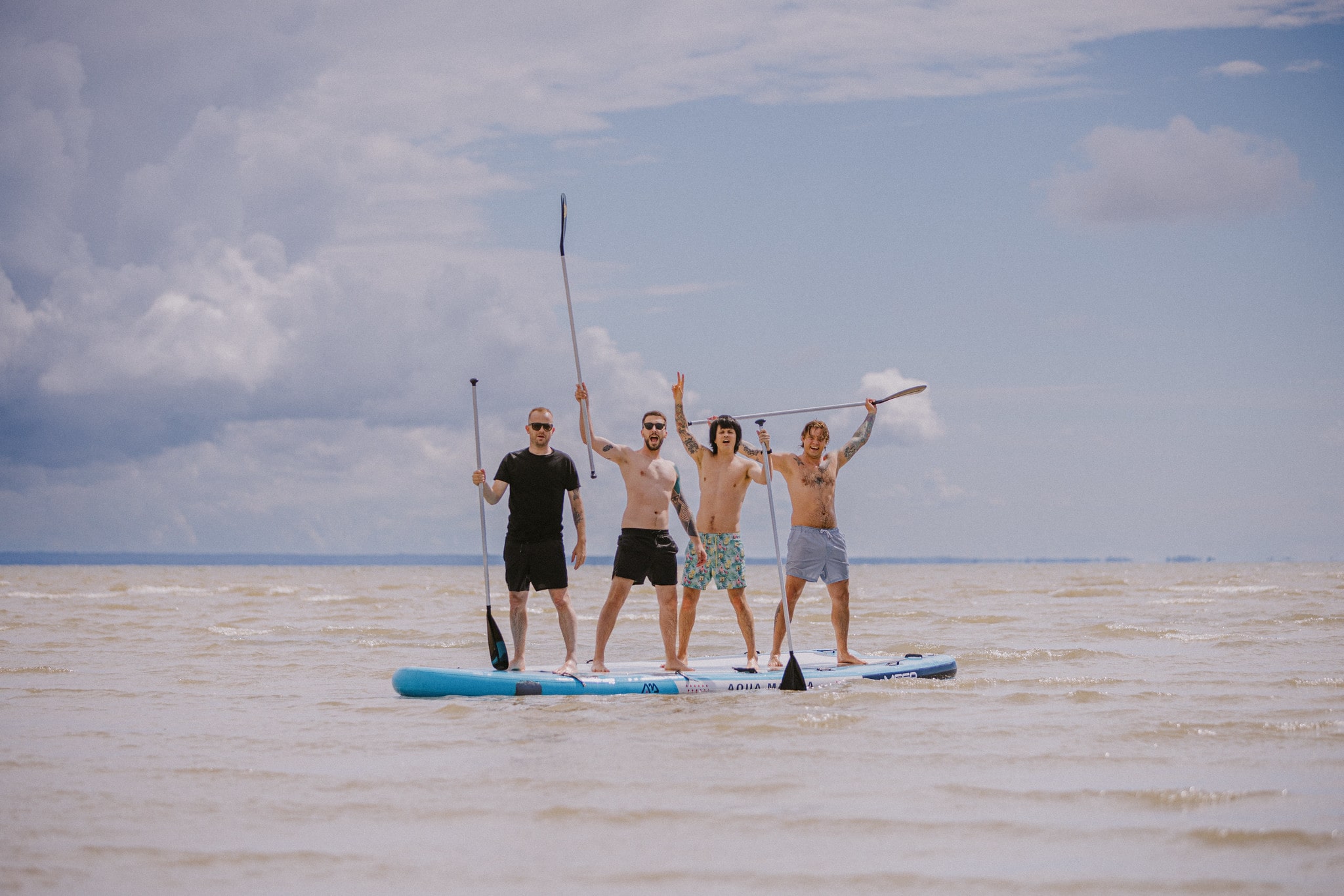 Four men on SUP board in Pärnu