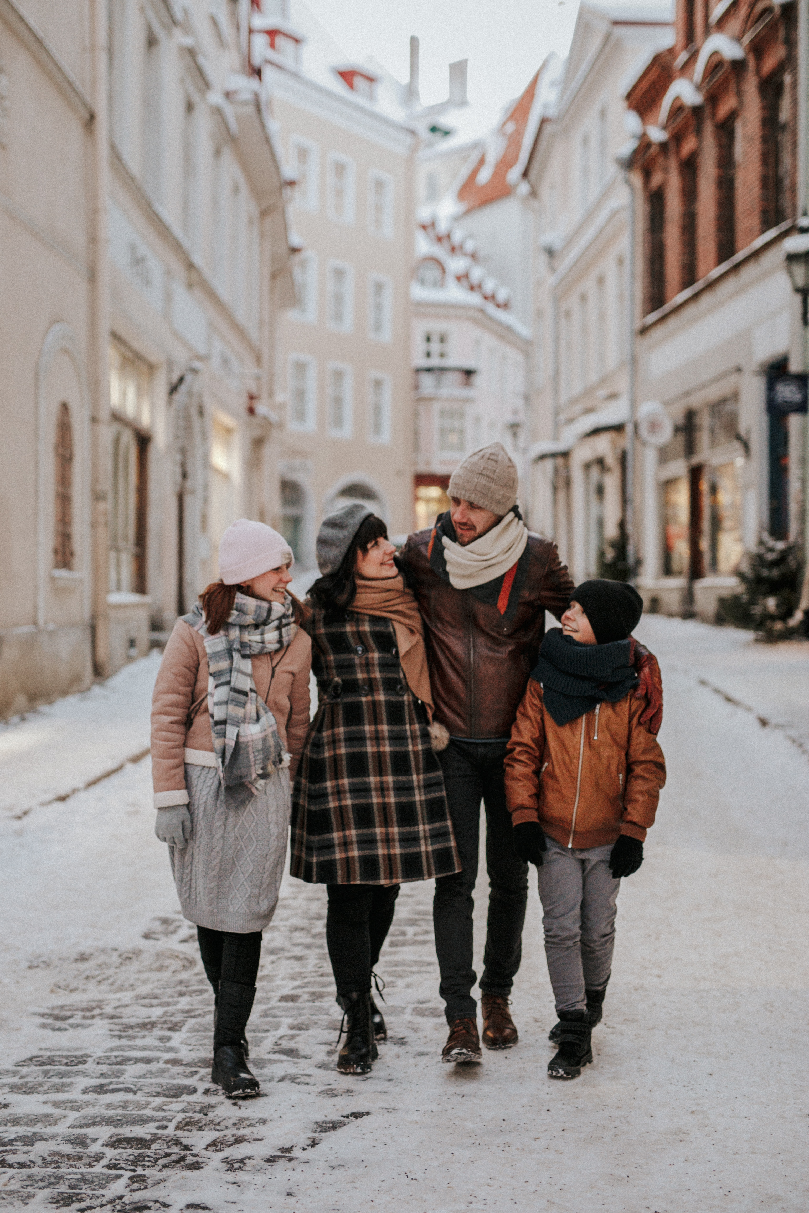 Family enjoys wintery Tallinn Old Town at Christmas