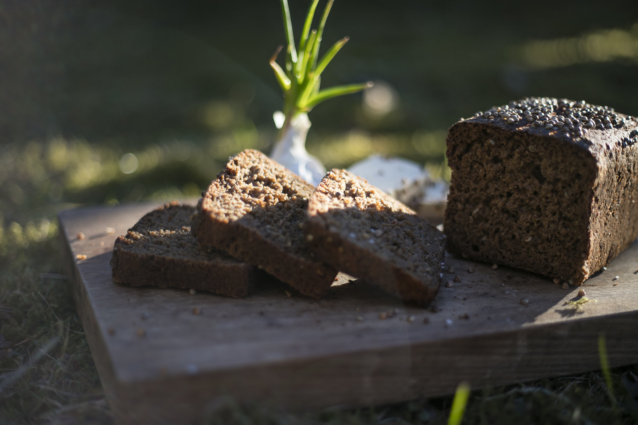 Estonian black bread cut into slices on a wooden board