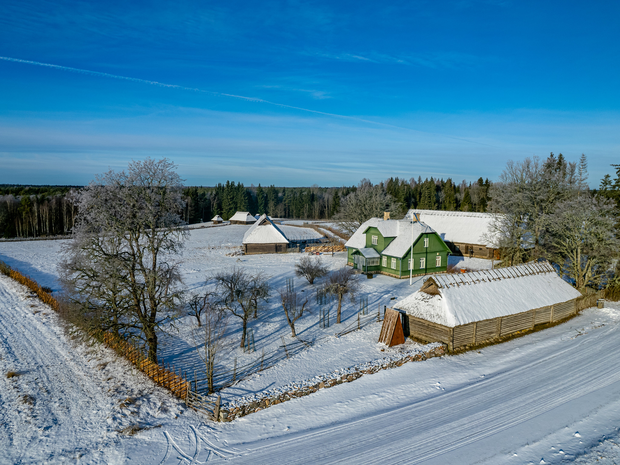 Snow covering house and barns at A.H. Tammsaare Museum