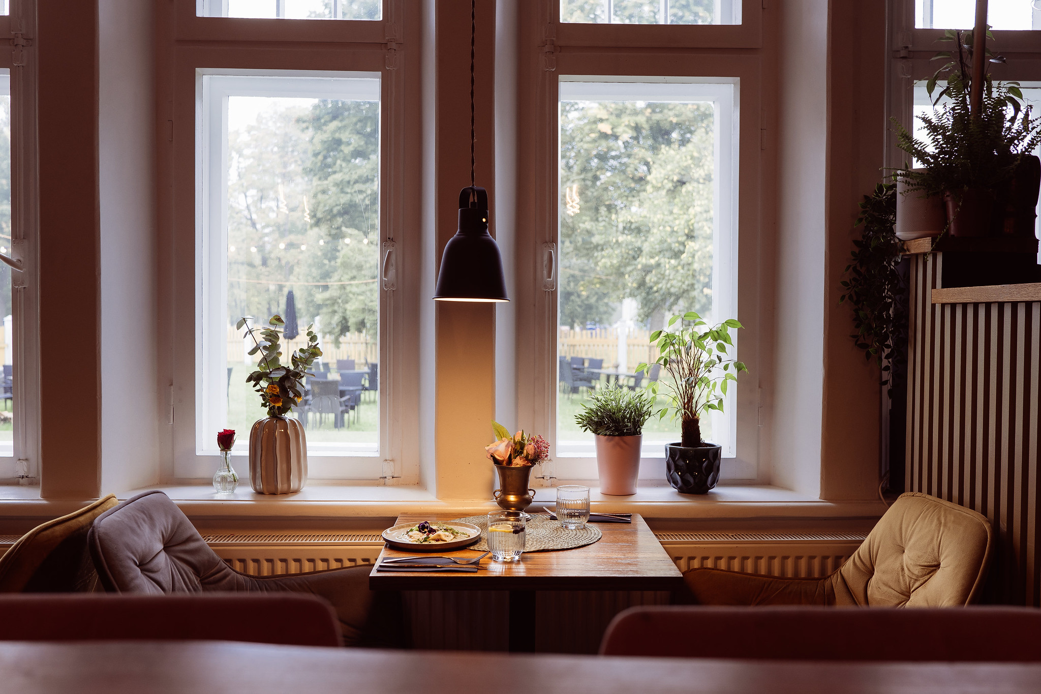 Cozy chairs near a window at a restaurant in Viljandi