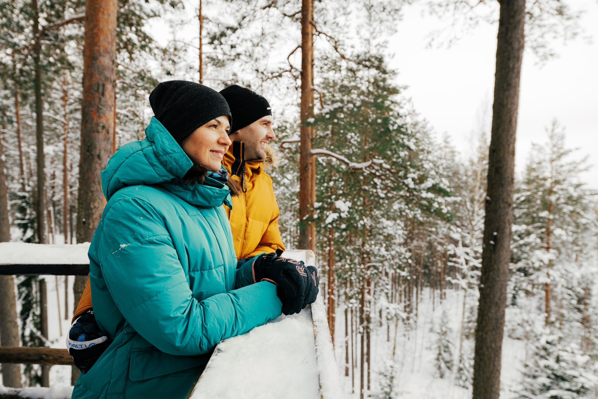 Wintery observation tower with 2 people