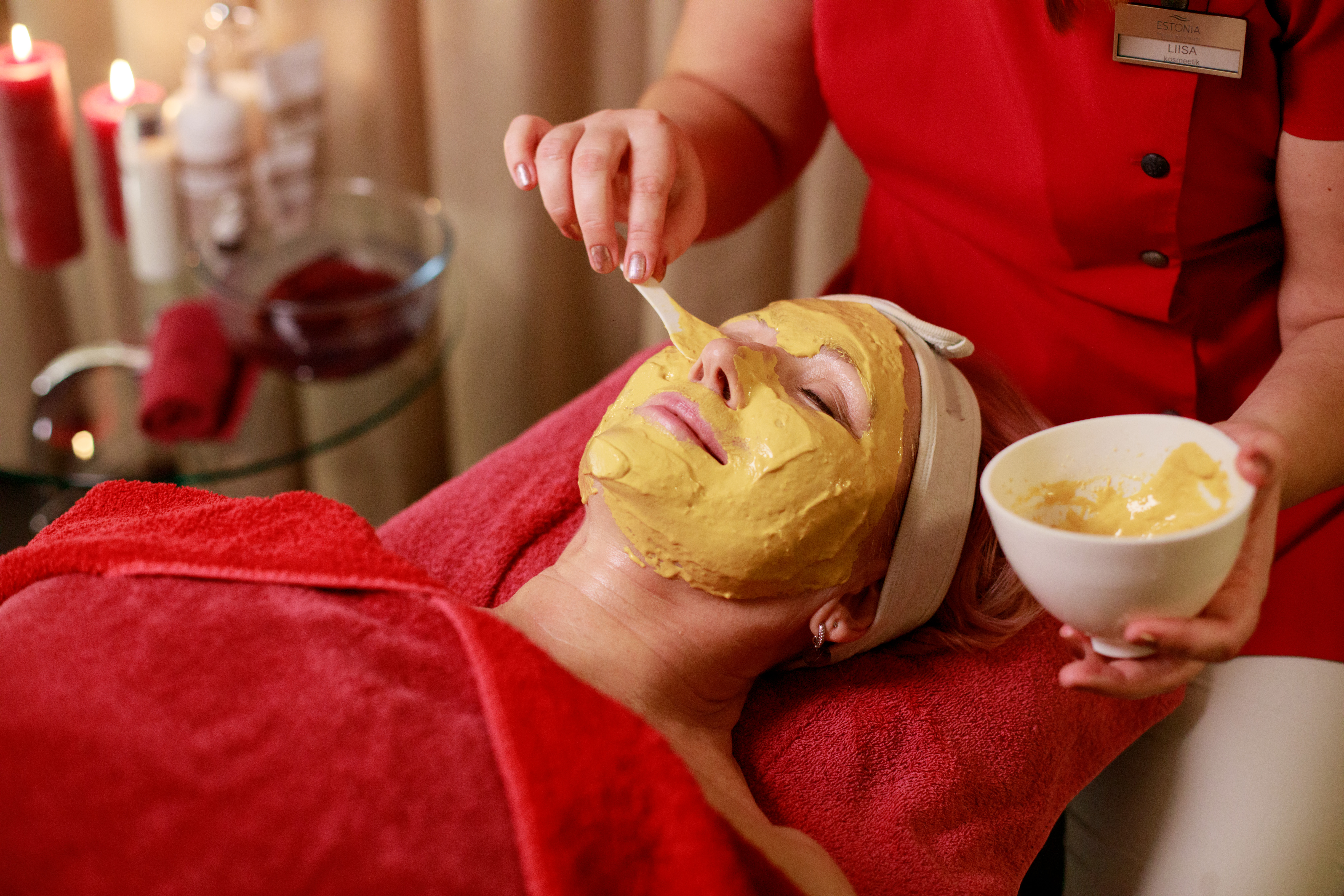 Women receives face treatment at spa in Pärnu, Estonia