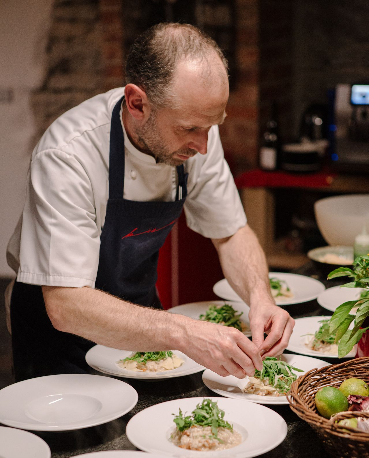 Chef plating food in Estonia