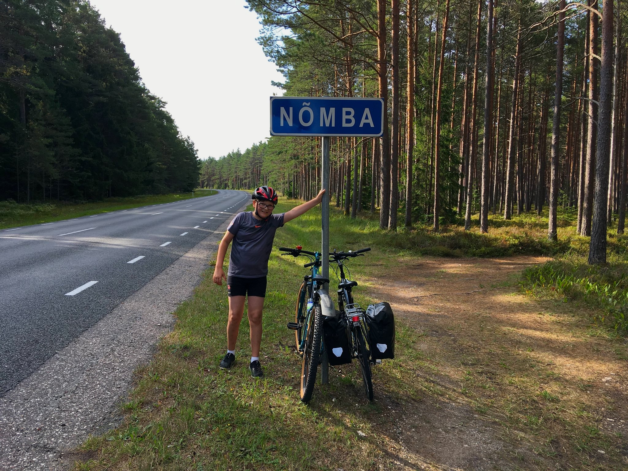 Biker on a quiet road in Hiiumaa, EuroVelo 10/13 in Estonia