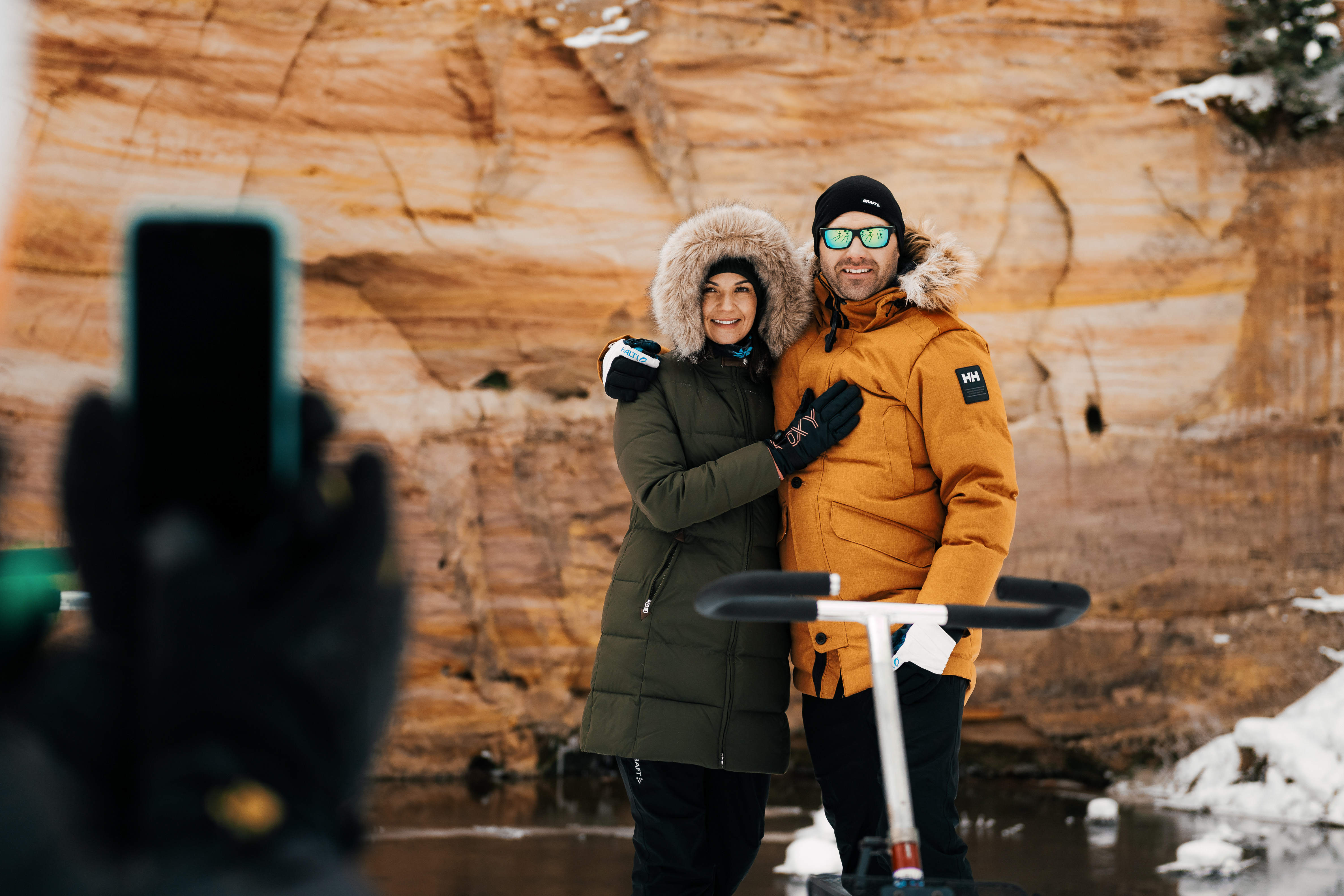 Couple pose for a photo in South Estonia during winter