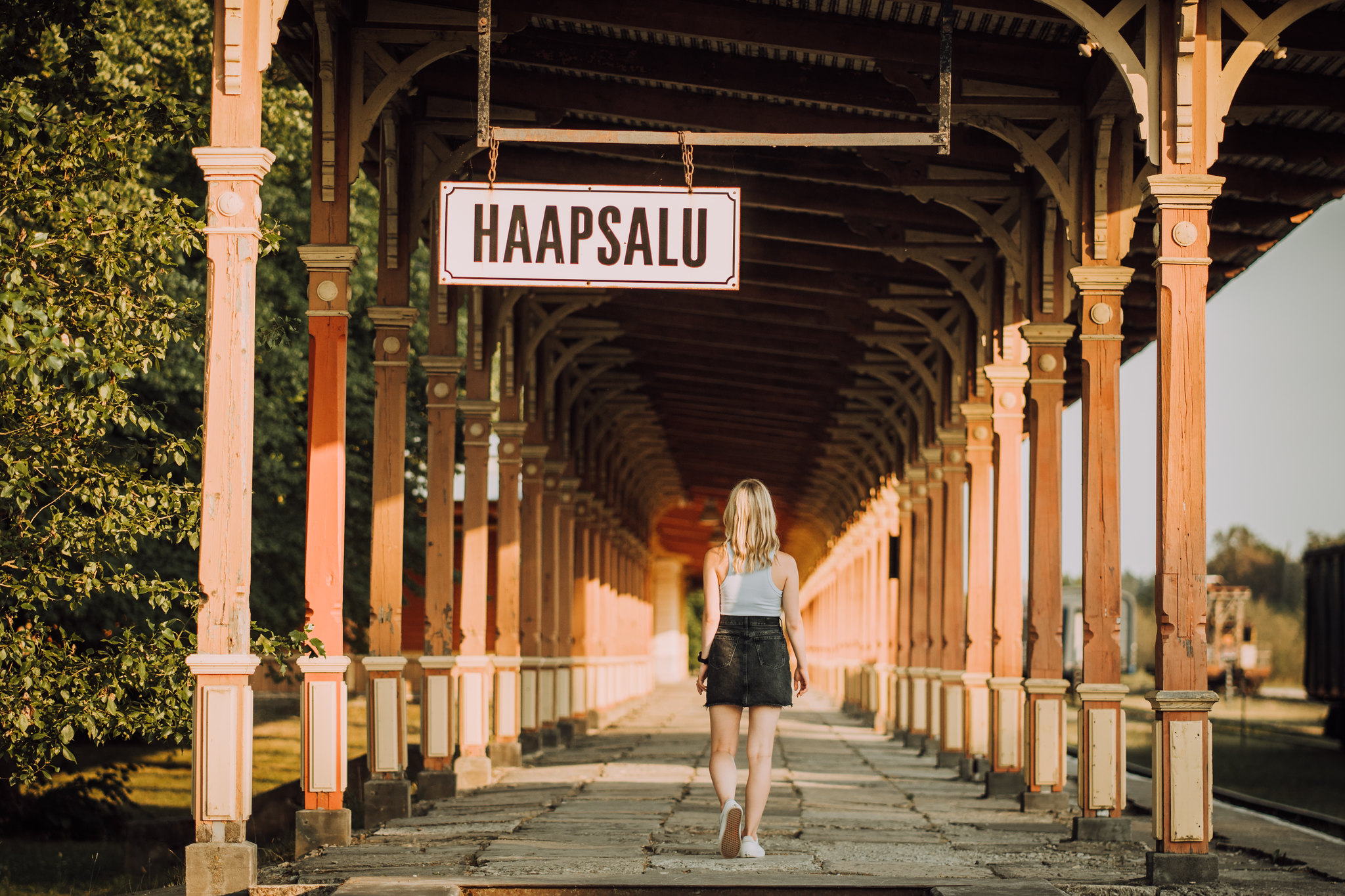 Woman walking on train platform in Haapsalu