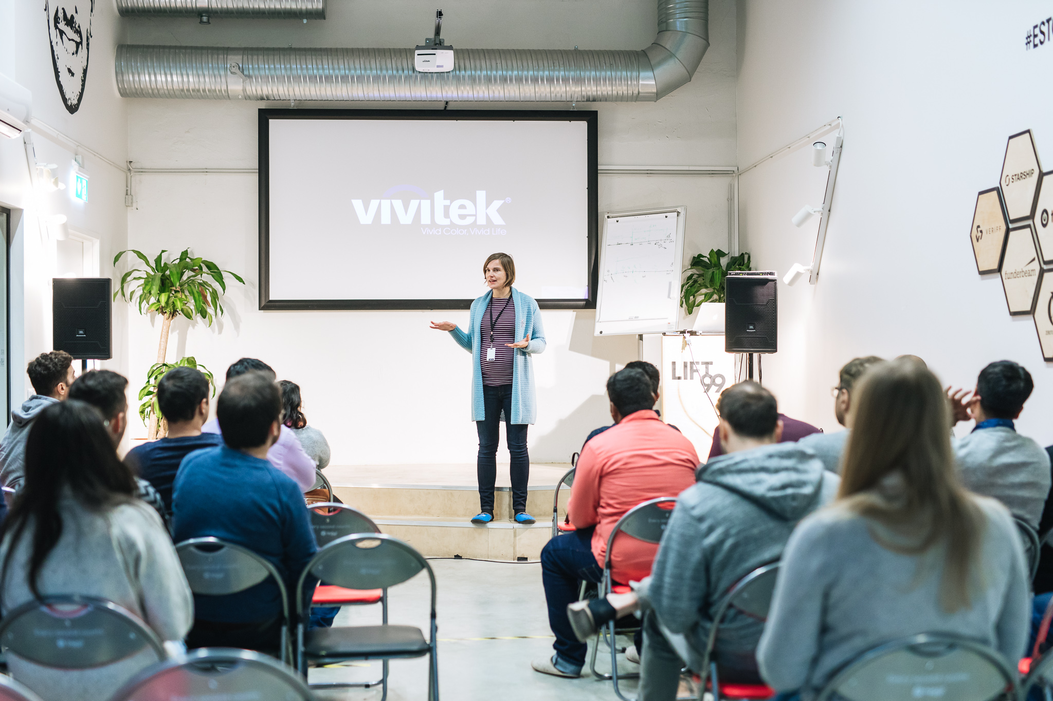 Woman giving talk at coworking space in Tallinn Lift99