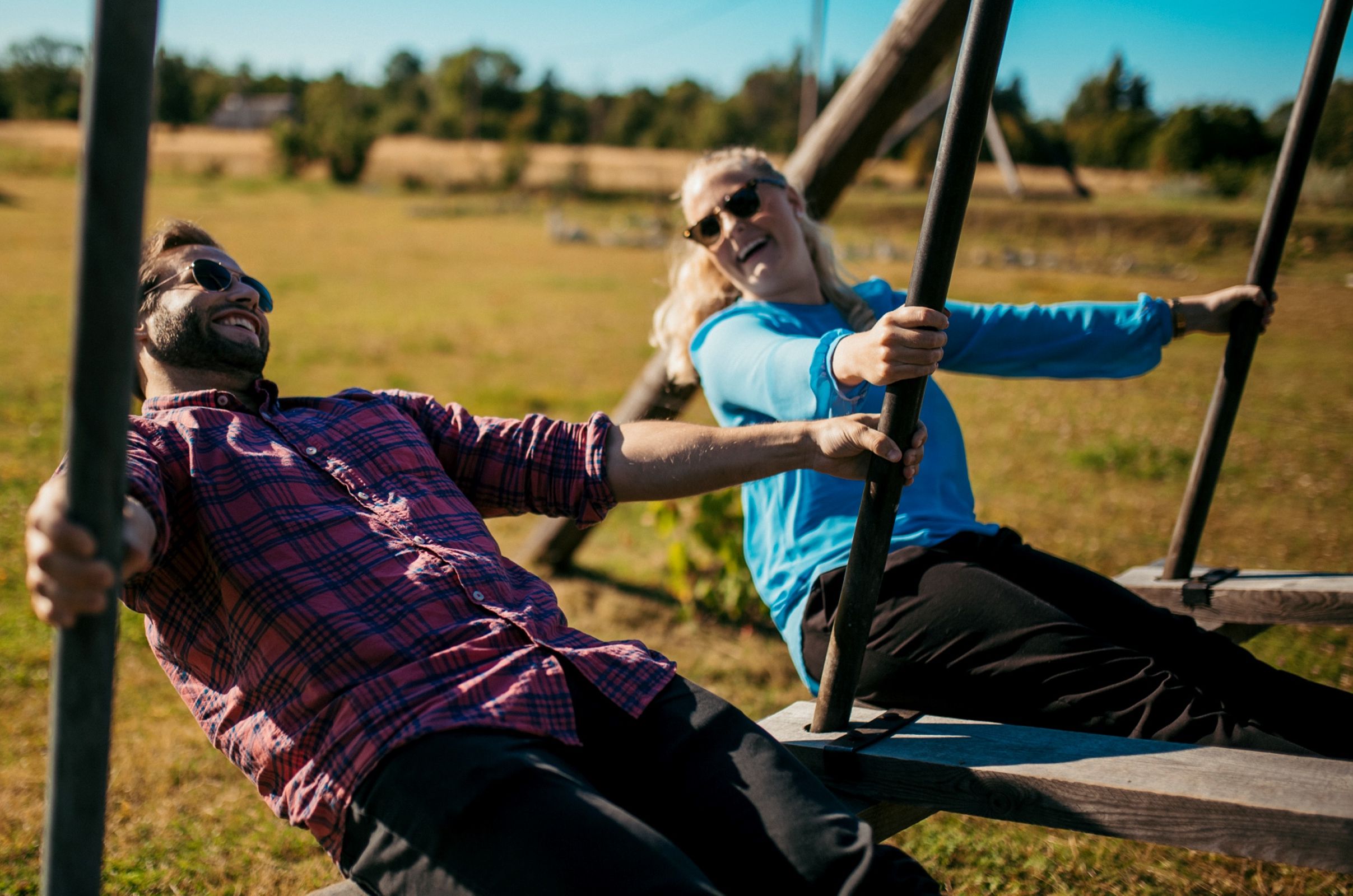 couple in a village swing