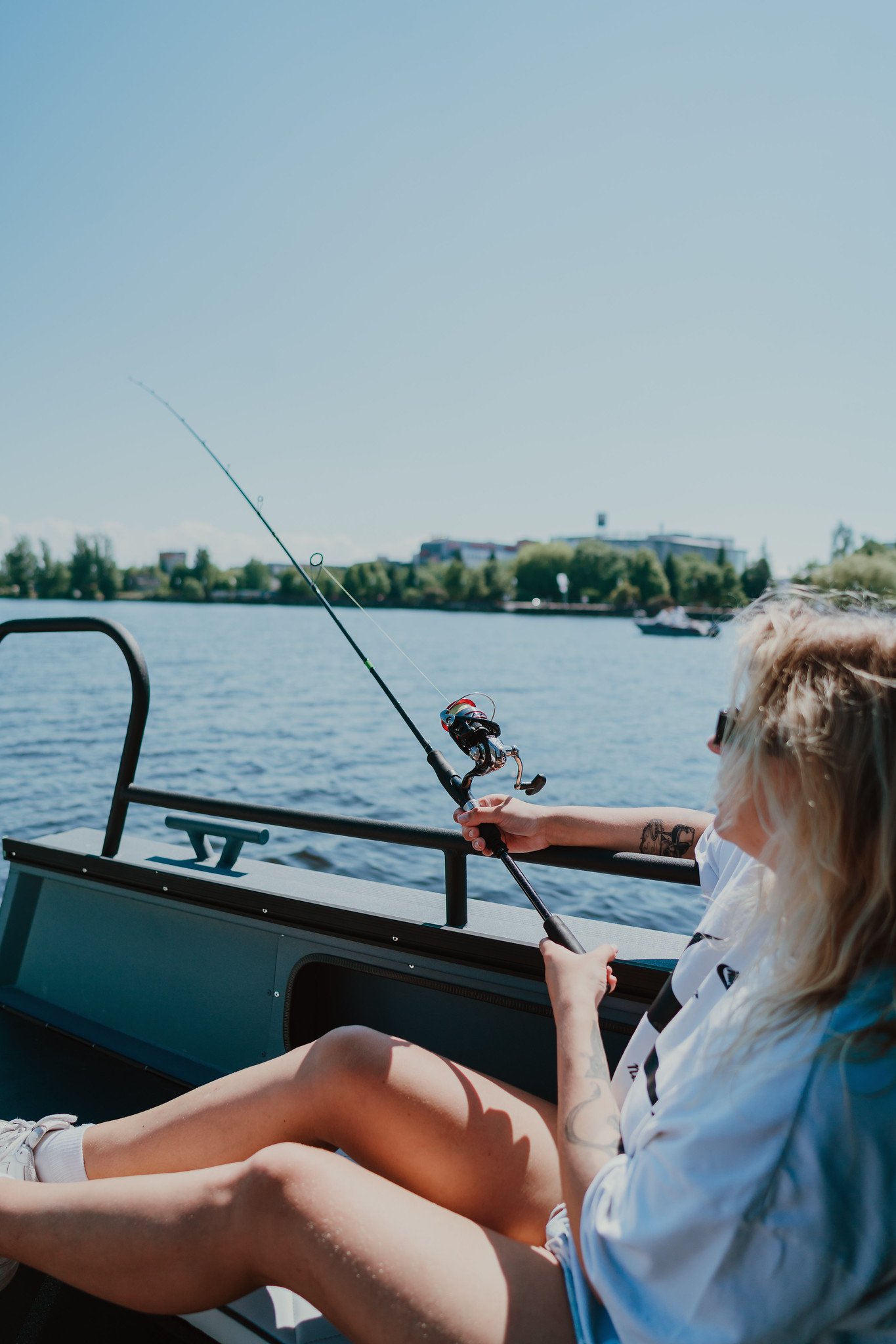 Woman fishing in Estonia