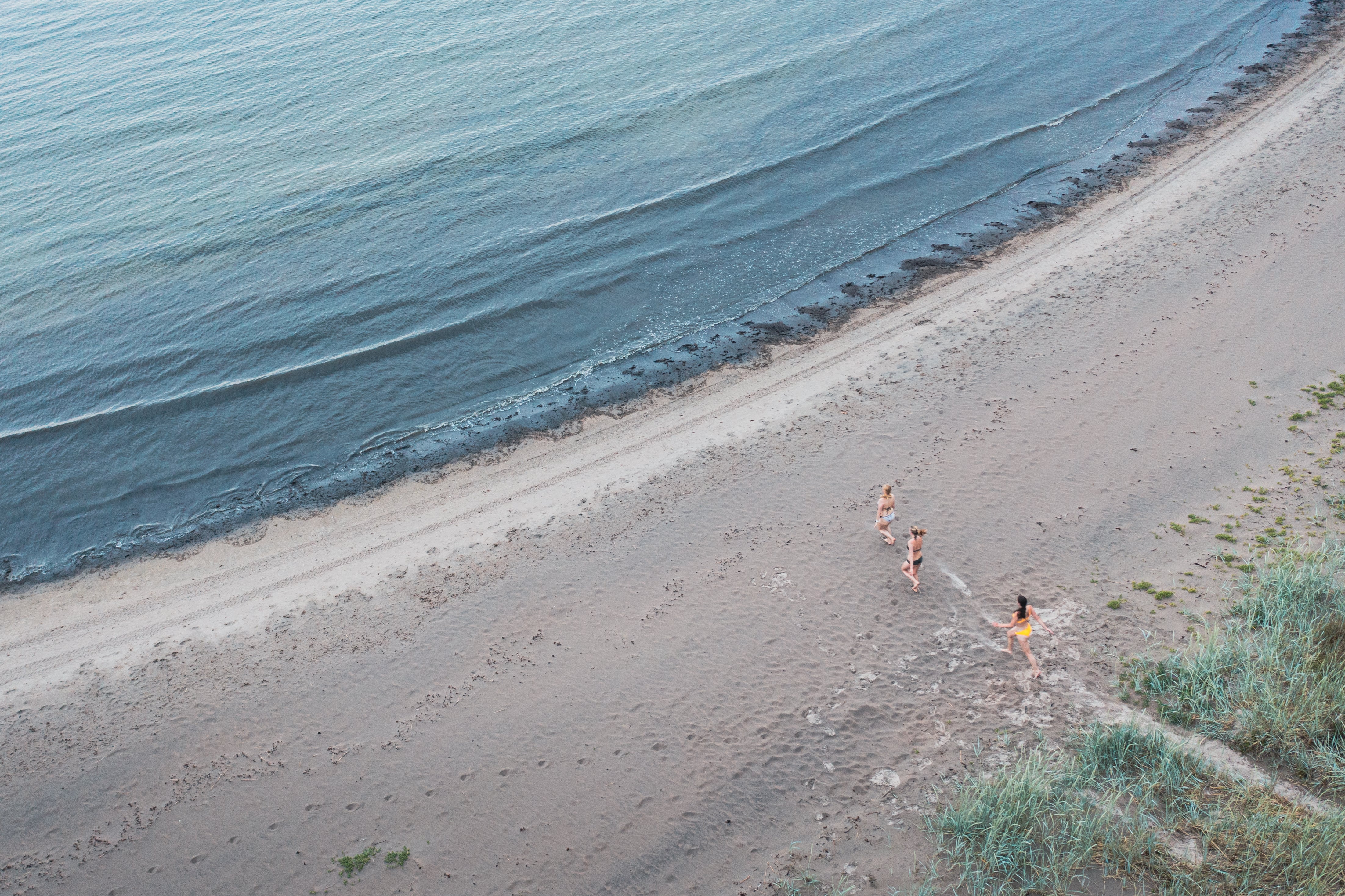 Women running on beach on Aegna Island in Estonia