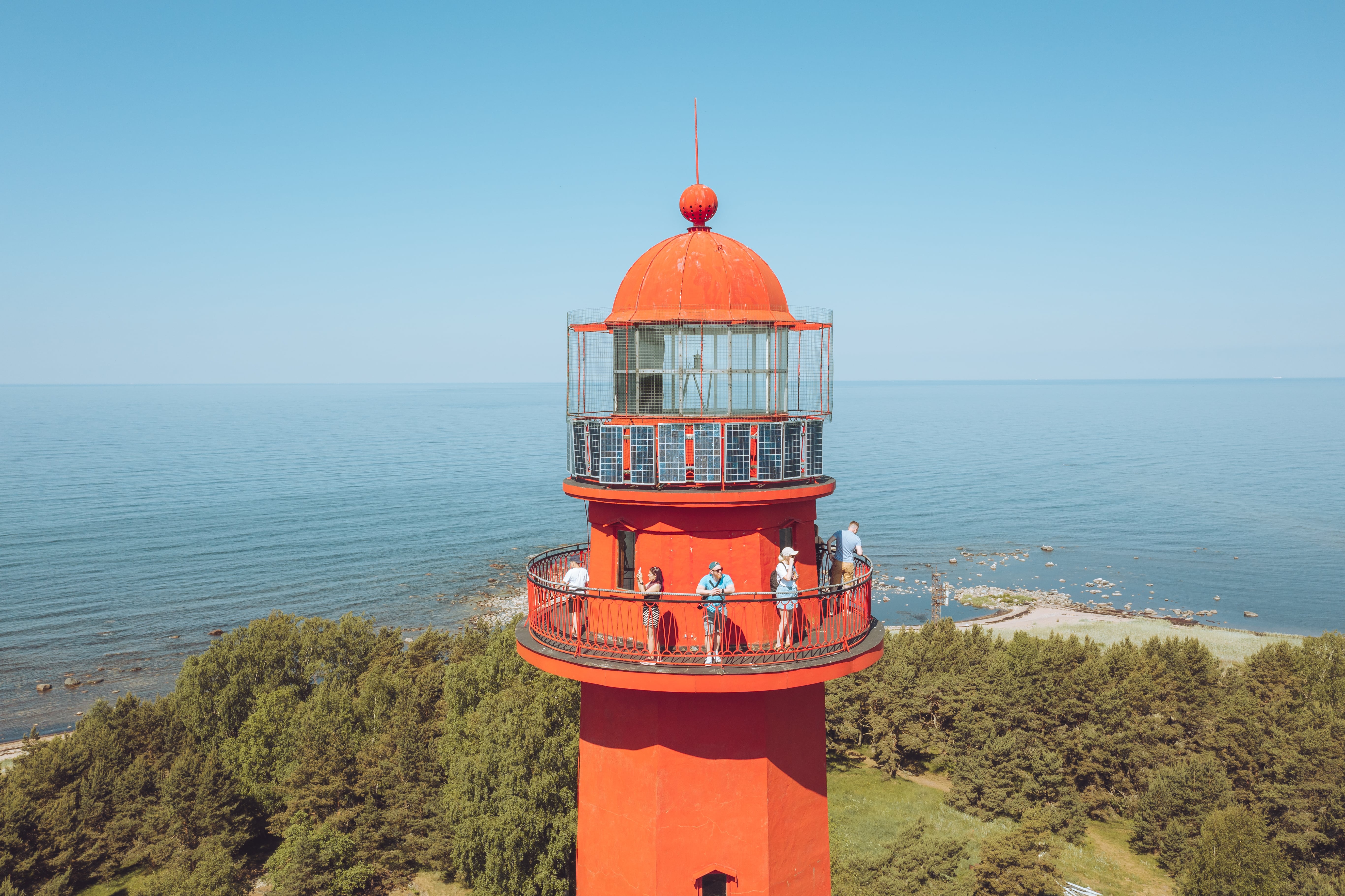 People on Naissaar Island's lighthouse in summer