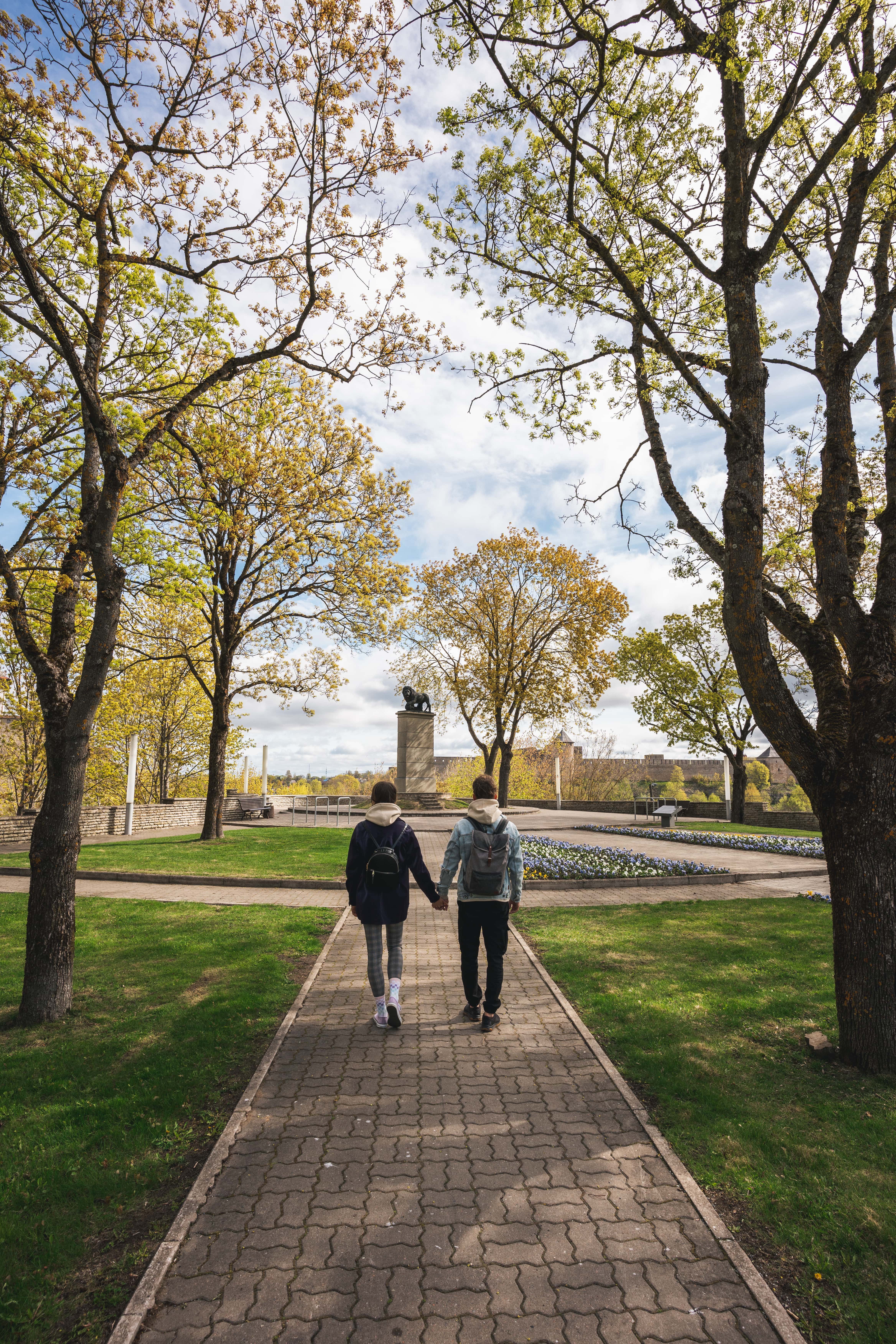 Couple walking in Narva during spring
