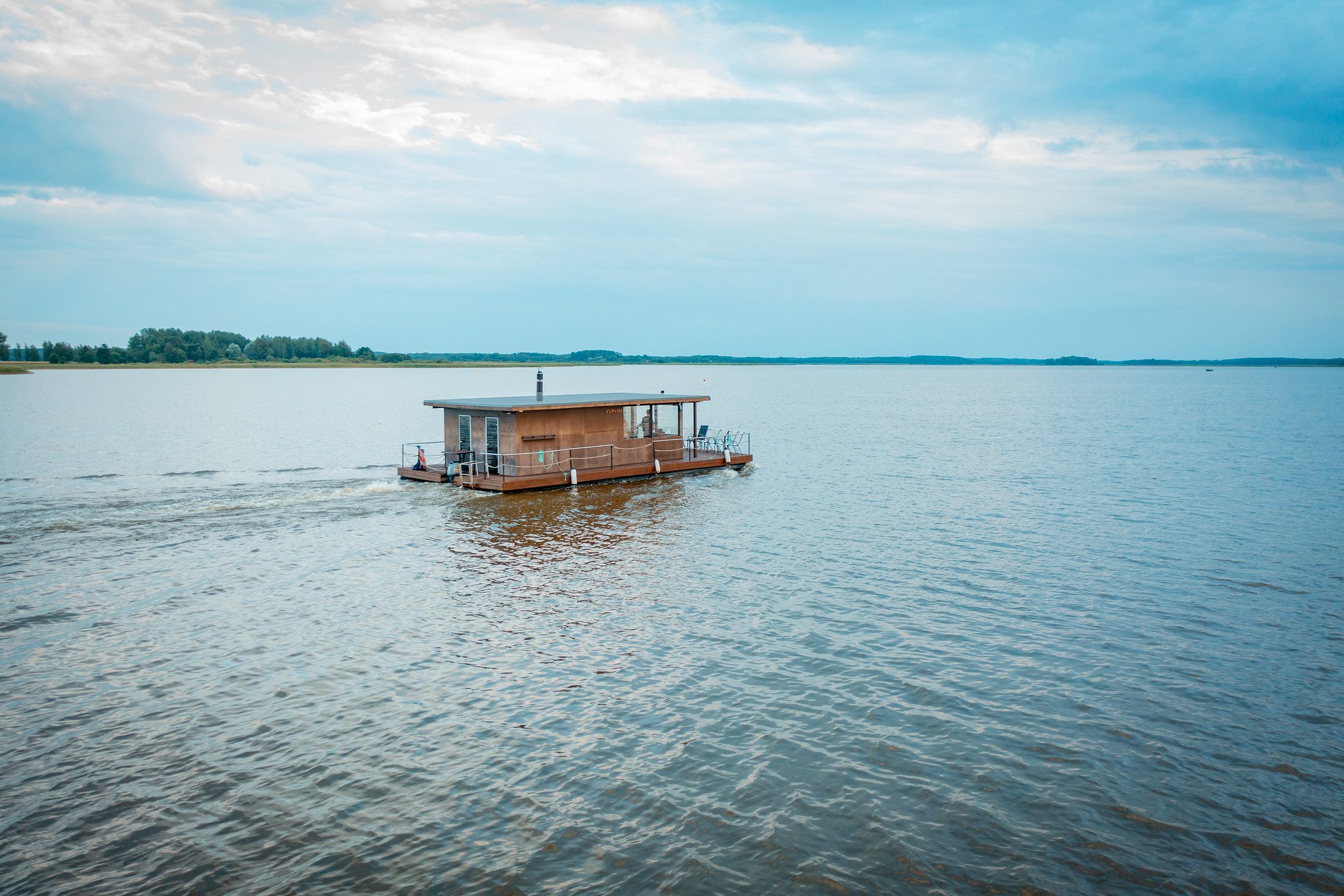 Floating raft sauna on a lake in Estonia
