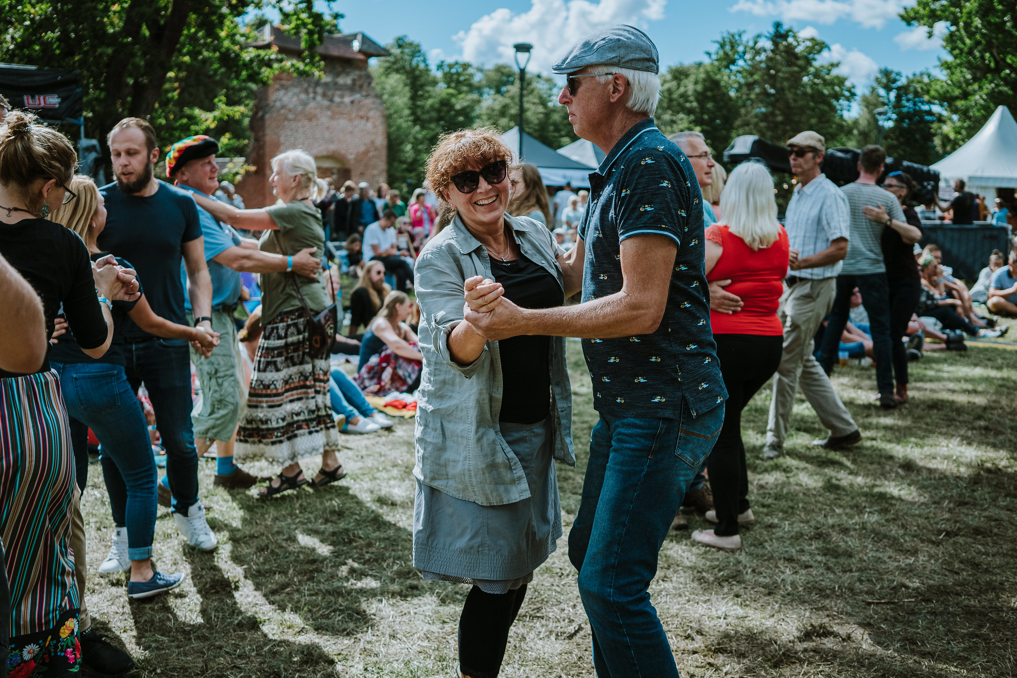 Couple dancing at folk music festival in Estonia