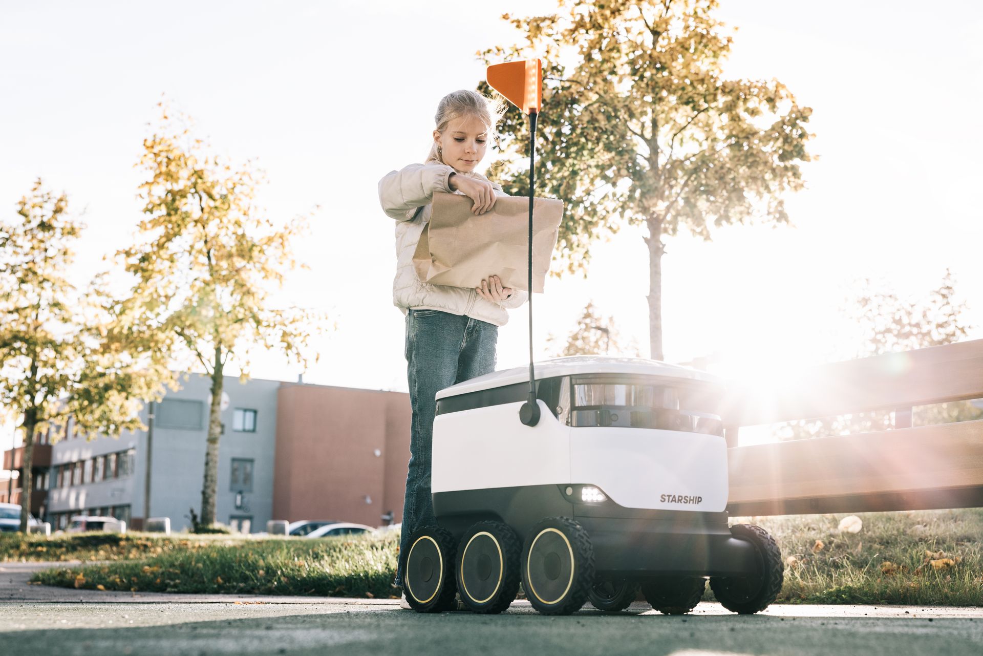 Girl receives package from innovative Starship robot in Estonia