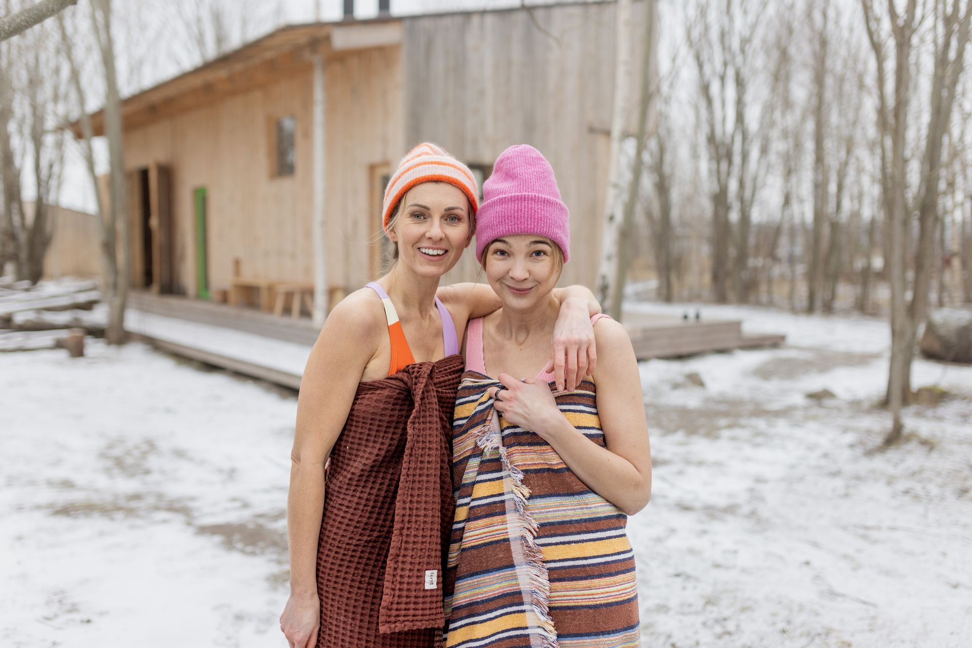 Two women experience sauna culture in Estonia