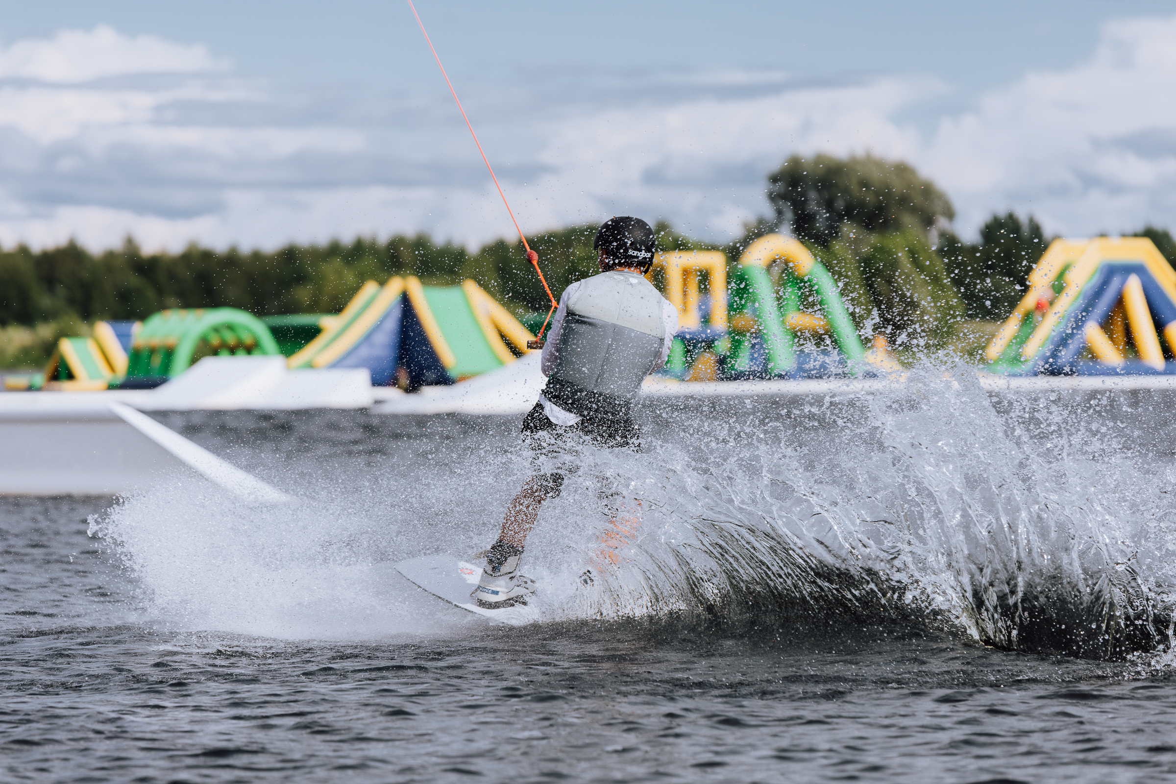 A paddleboard gliding on Kamari Lake at Põltsamaa WPark