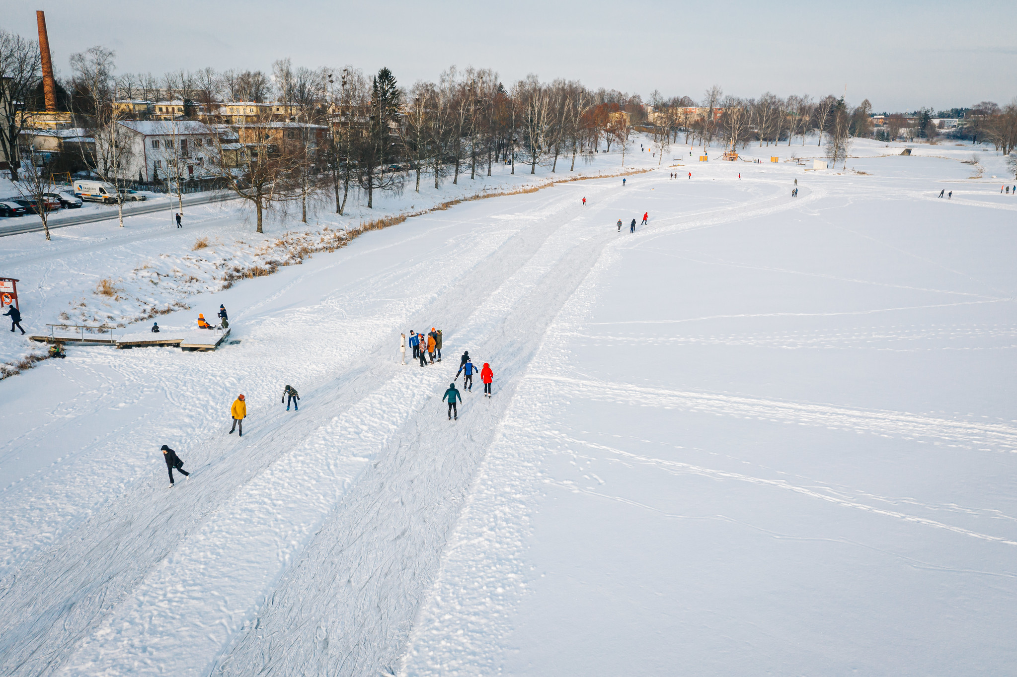 Ice skaters on a frozen lake in Viljandi, Estonia
