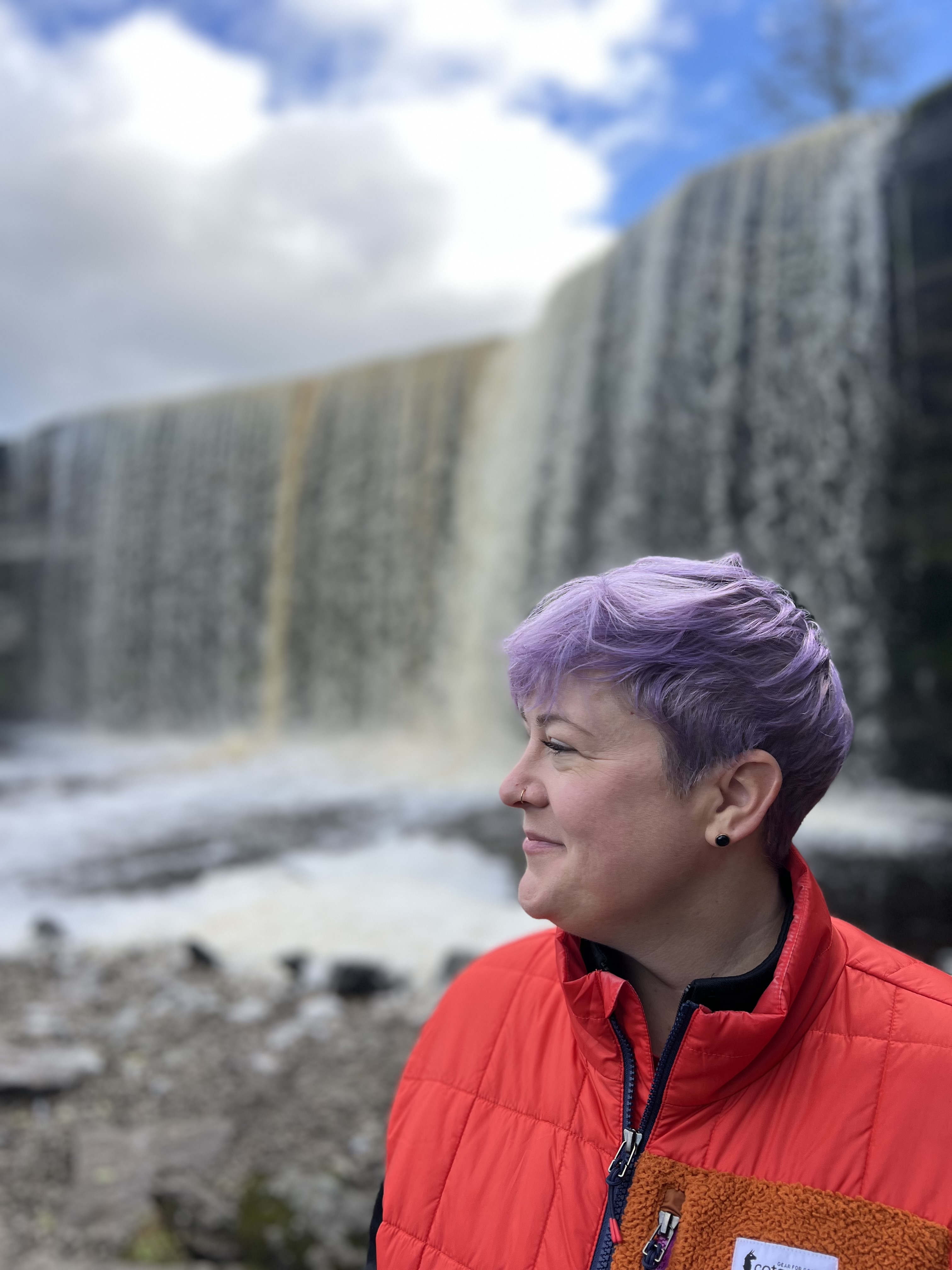Hillary Millán, writer for Visit Estonia, at Jägala Waterfall in Estonia