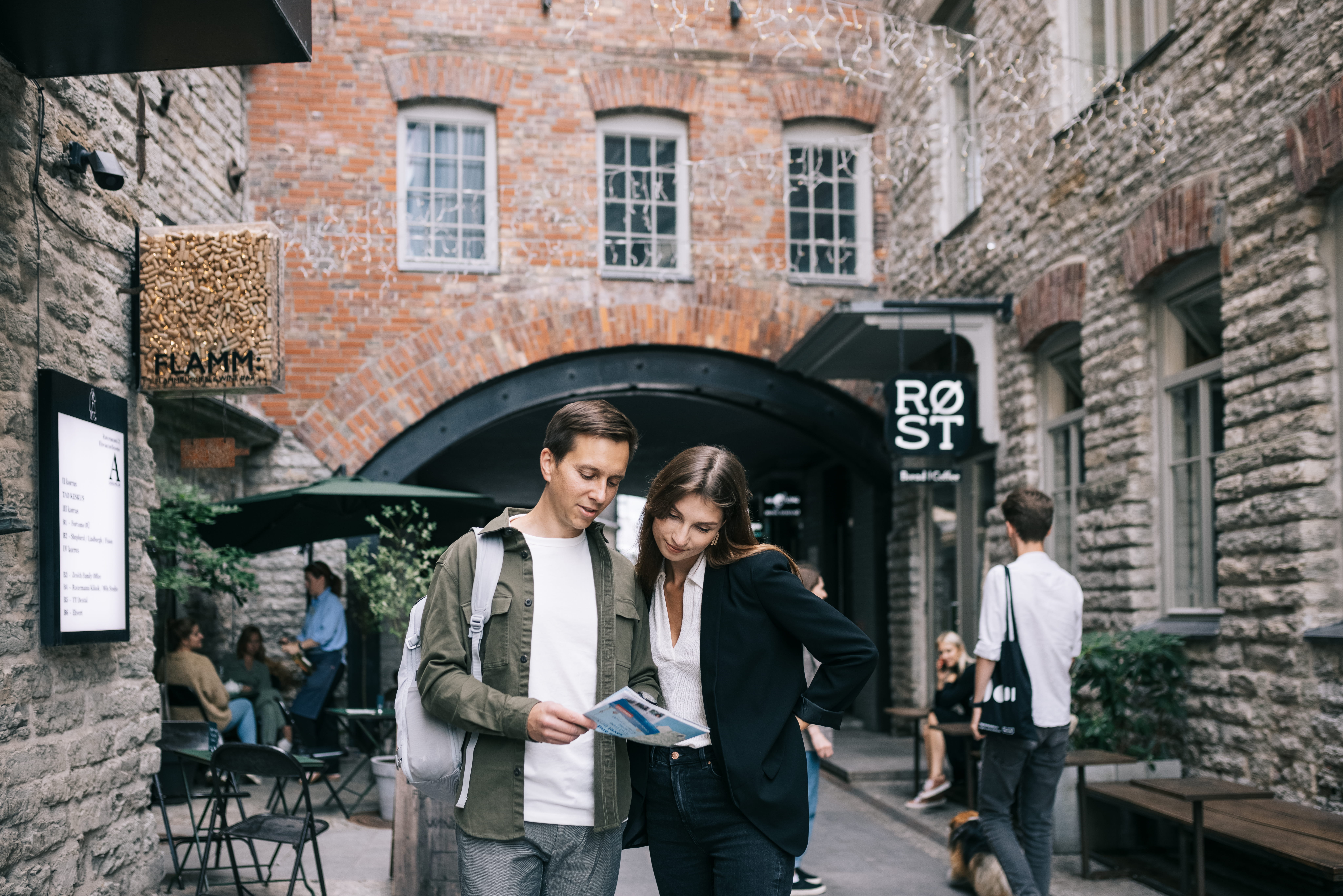 Couple looks at a map in the Rotermann Quarter of Tallinn