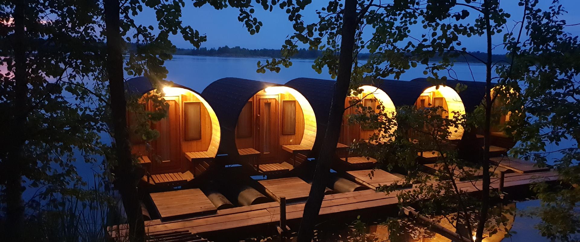 Barrel camping pods on water in Paekalda Holiday Centre