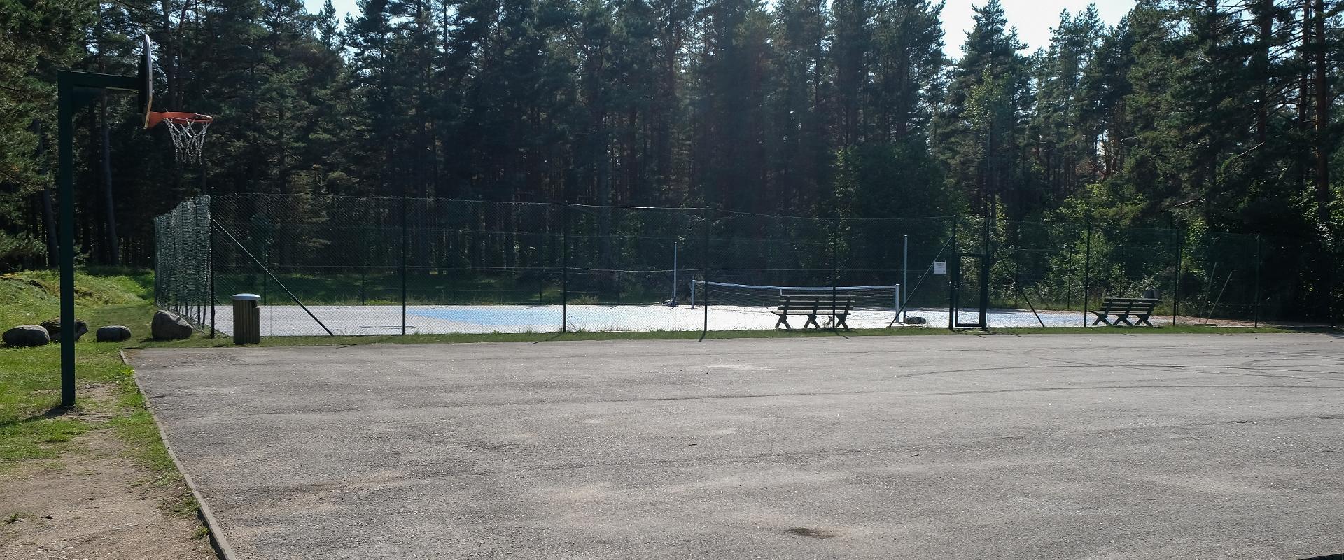 Tennis court and soccer field of the former community centre on Kihnu