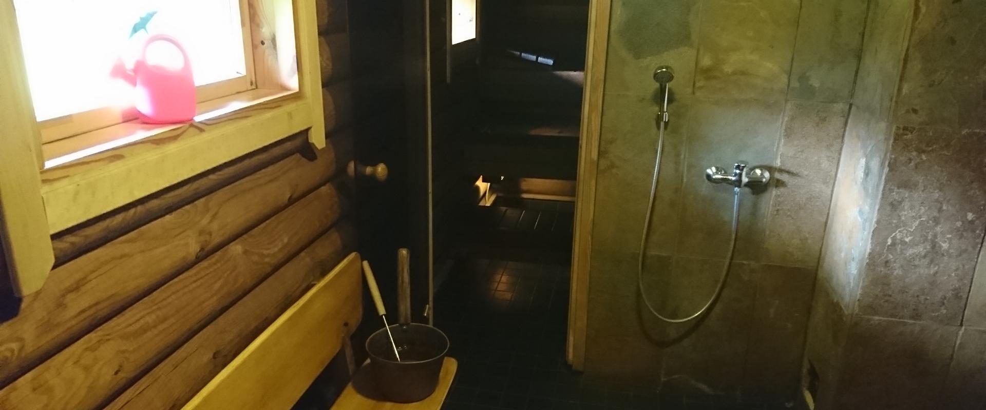 Markna Tourist Farm Sauna House - wood heated sauna and a shower room.