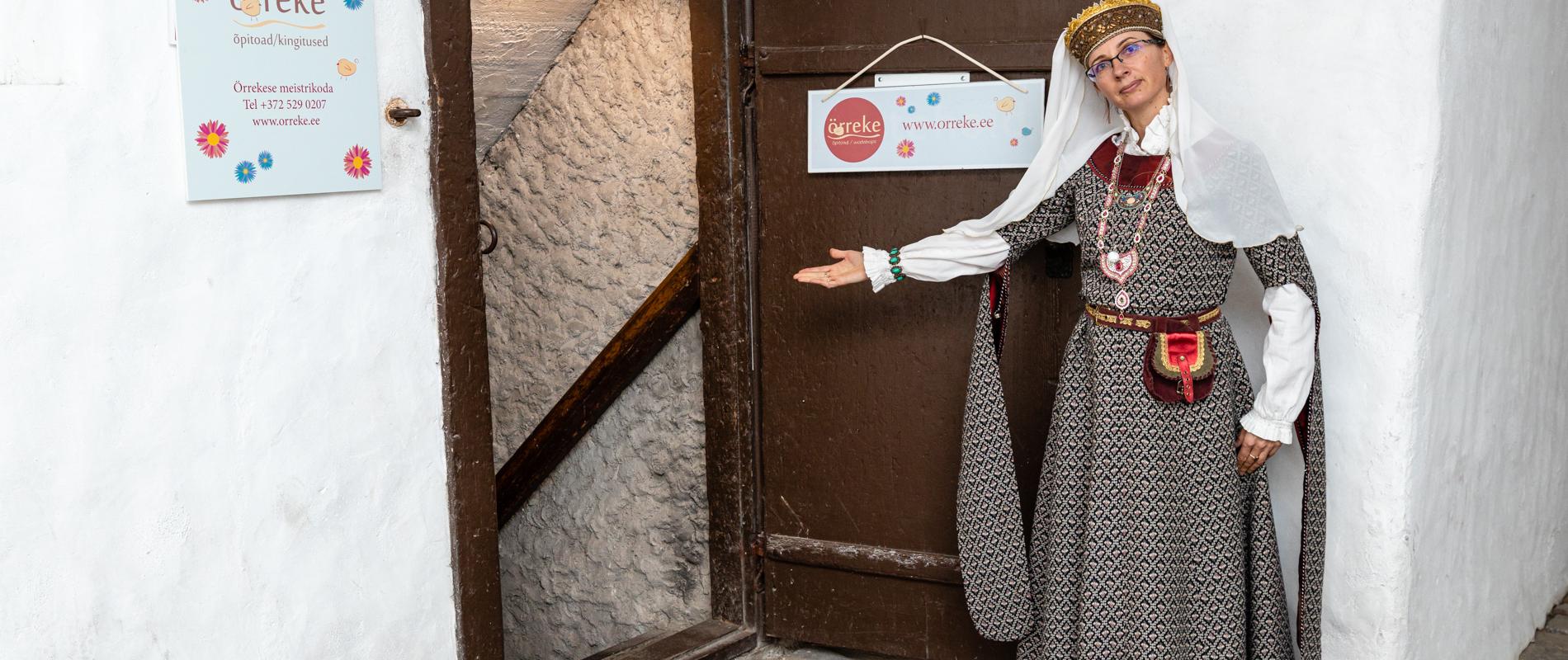 A woman in medieval clothing in Tallinn's Old Town