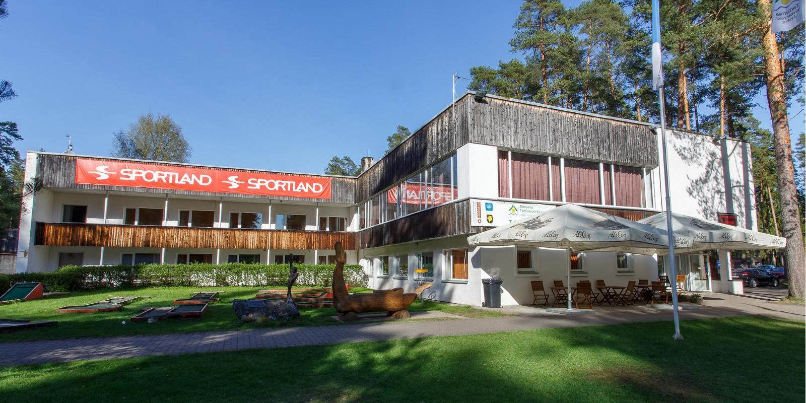 The main building of Tartu County Recreational Sports Centre with a café and rental