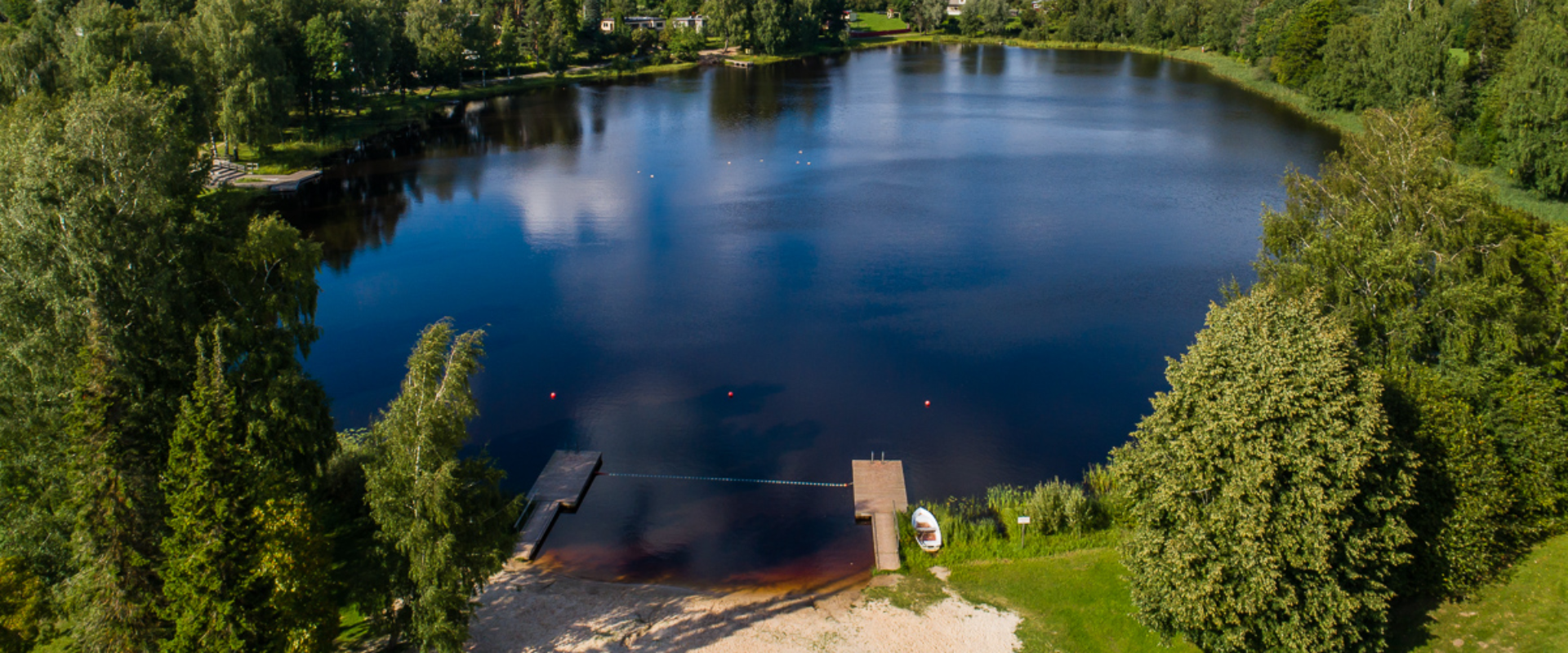 Lake Riiska is situated by the Valga road in the south-eastern part of the town of Tõrva. The lake has shallow shores, a sandy lake bed and greenish s