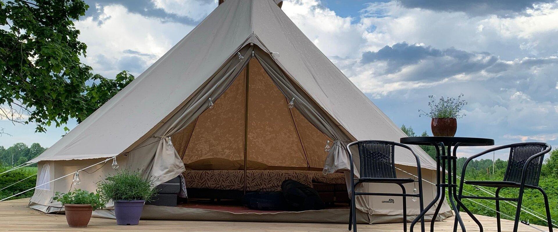 Comfortable accommodation in a spacious tent that's equipped with everything you need for a cosy stay. One tent has beds for up to four people where y