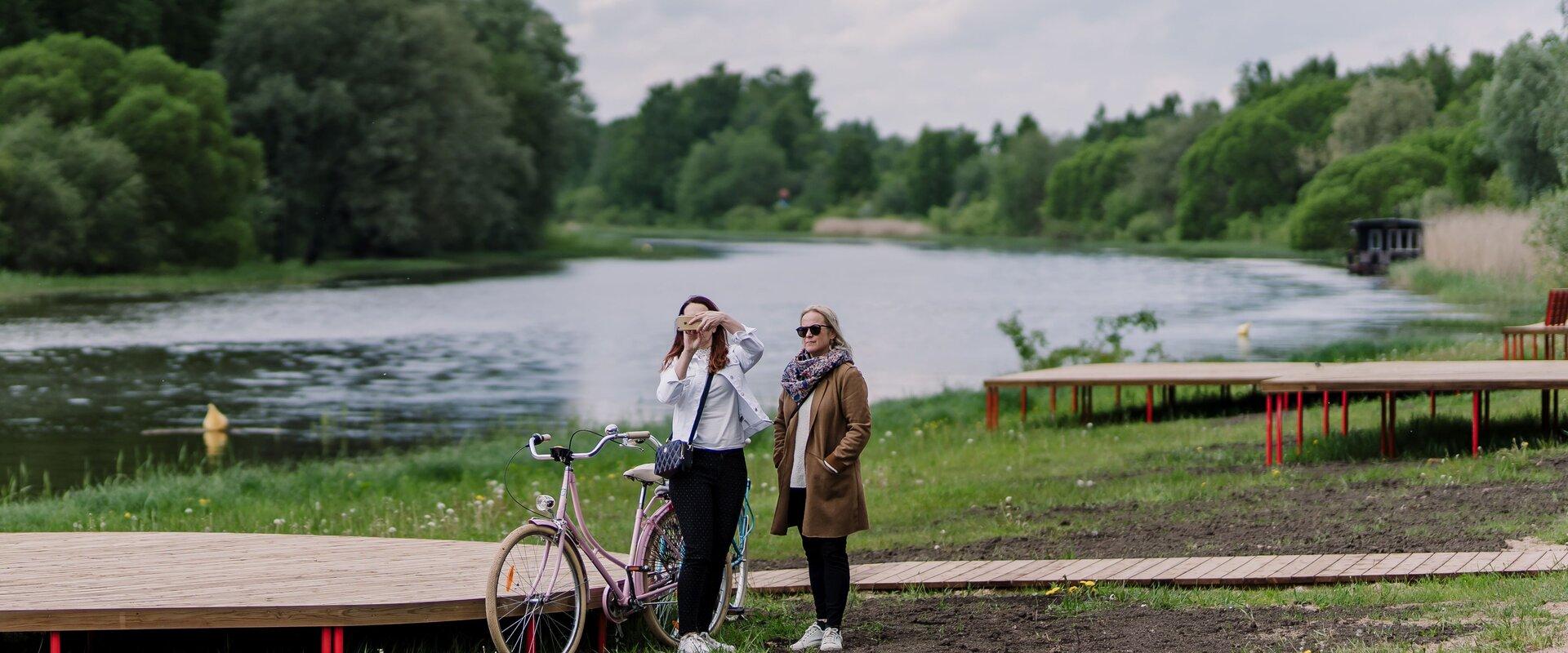 Emajõe City Beach and ladies with a bicycle