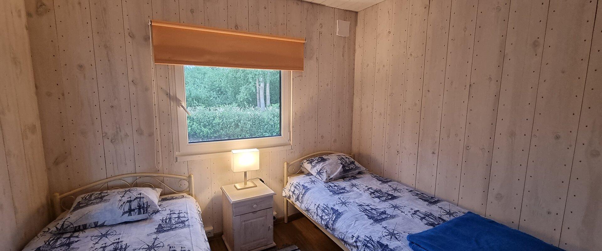 Pildil Jõesuu Turismitalu puhkekeskuse magamistuba
