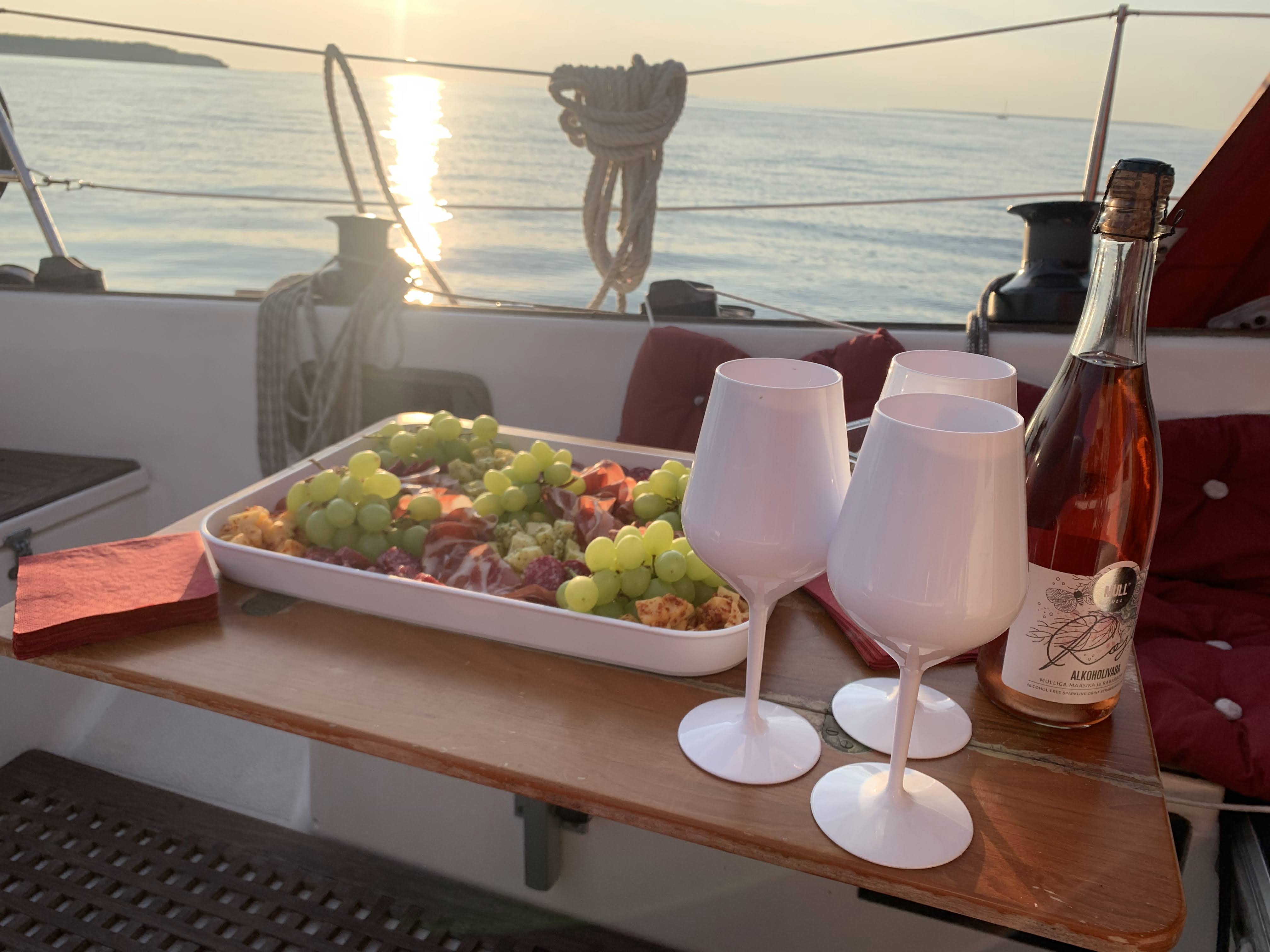 Enjoy a delightful sea voyage on Tallinn Bay! Come on board, where delicious cheeses, select salamis, and summery handcrafted Estonian drinks await. T