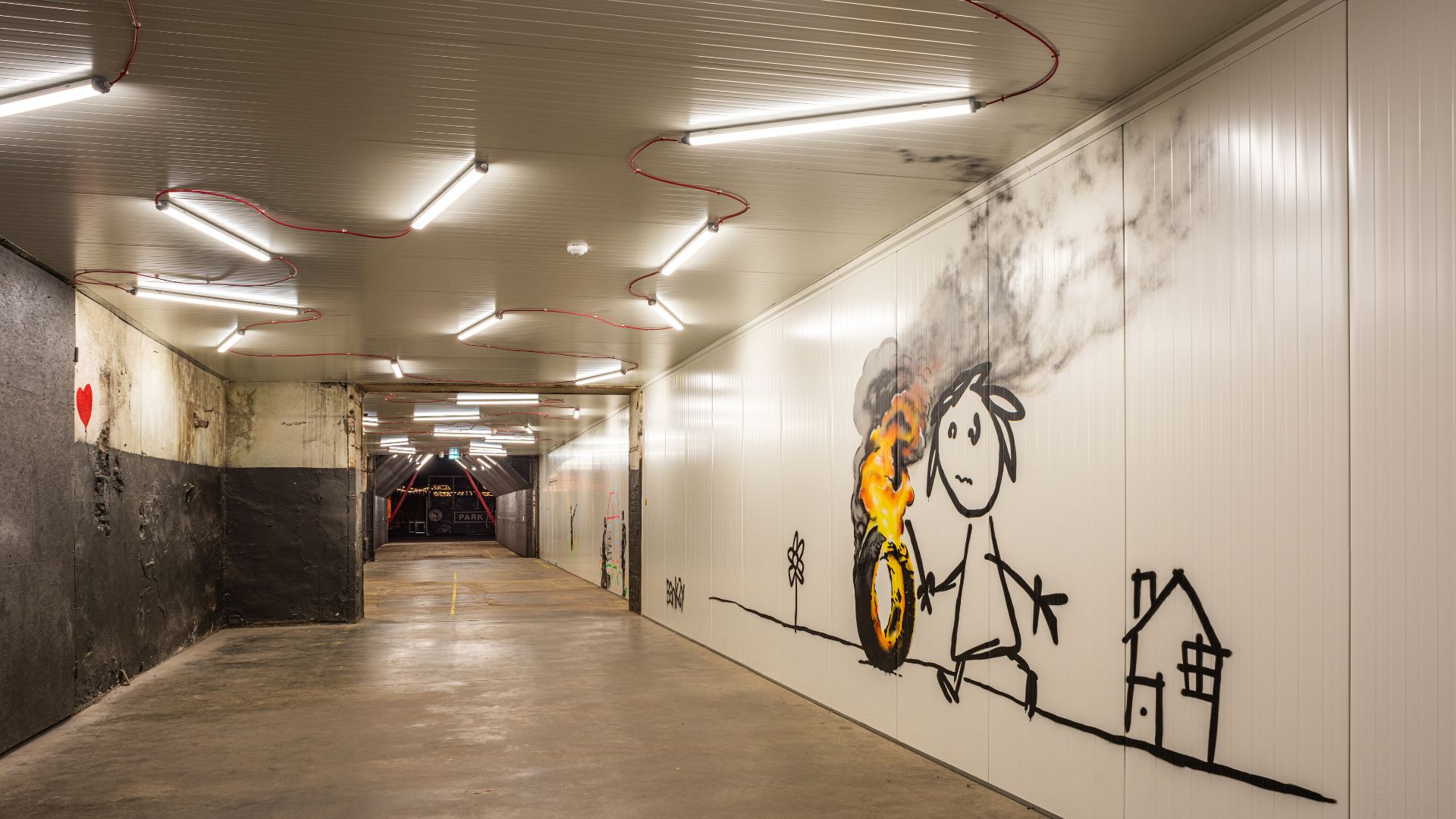 Banksy joonistus tunnelis