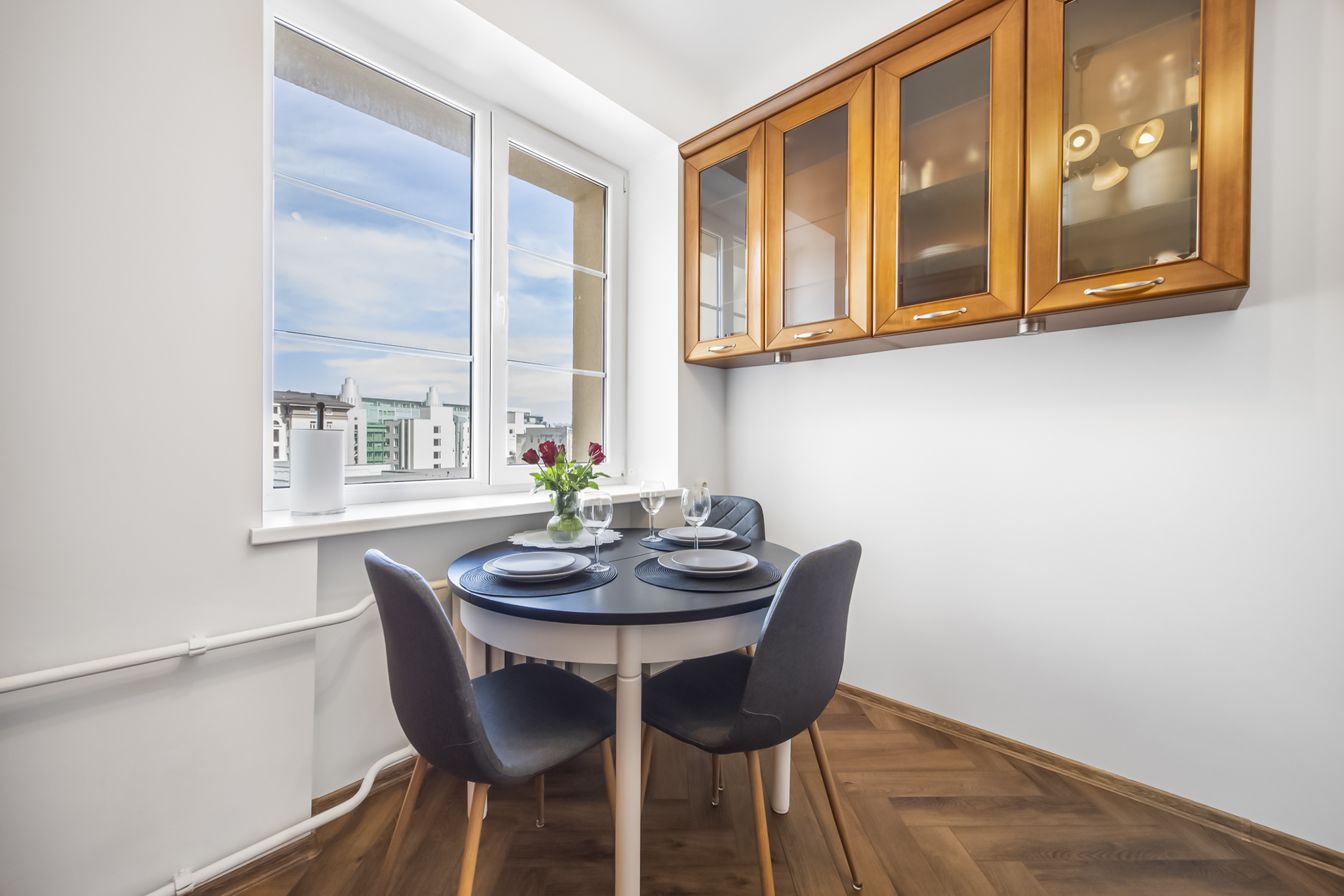 A light-filled kitchen with a dining table