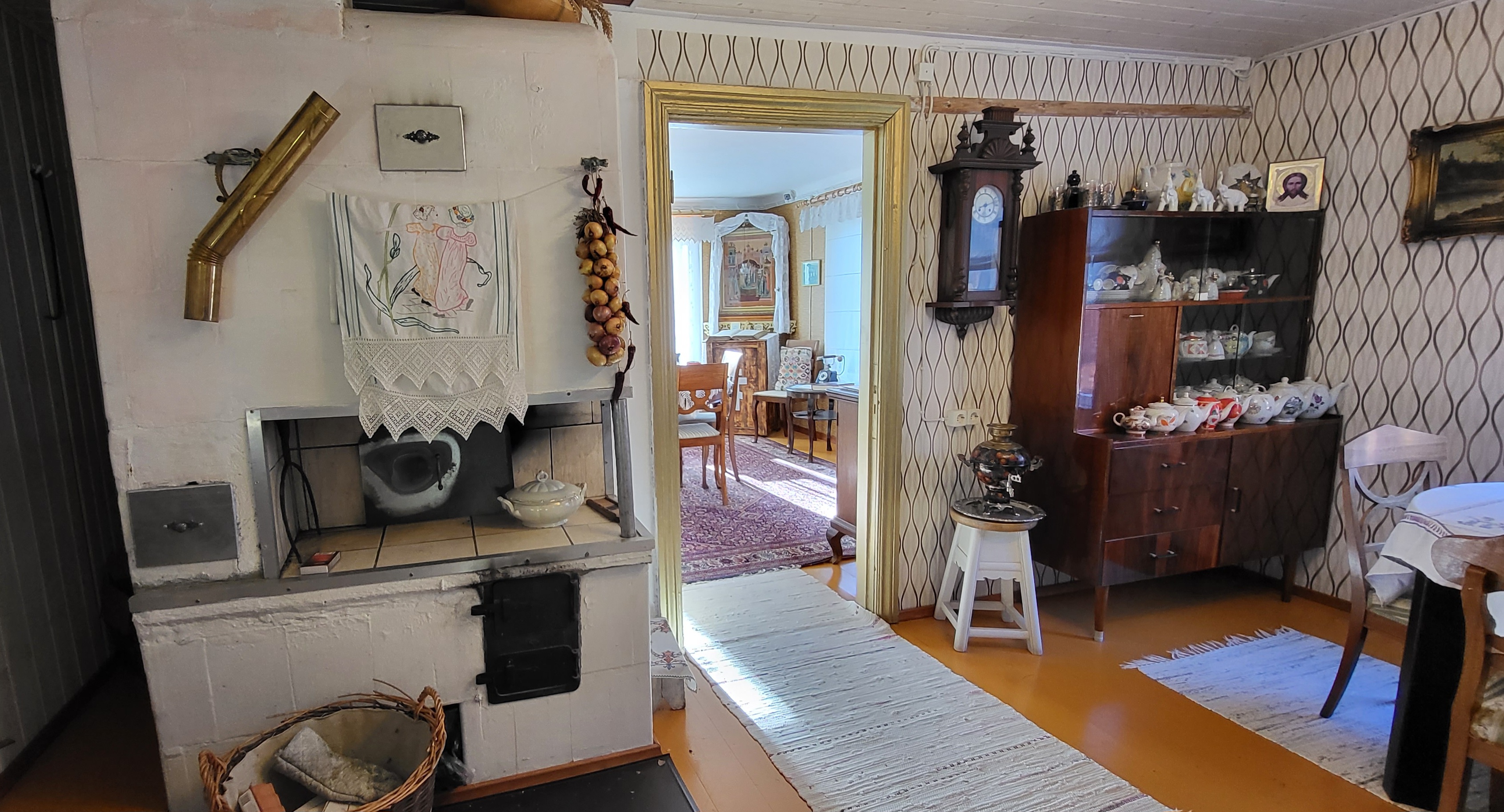 Piirissaare Old Believers Museum stove and view of the room