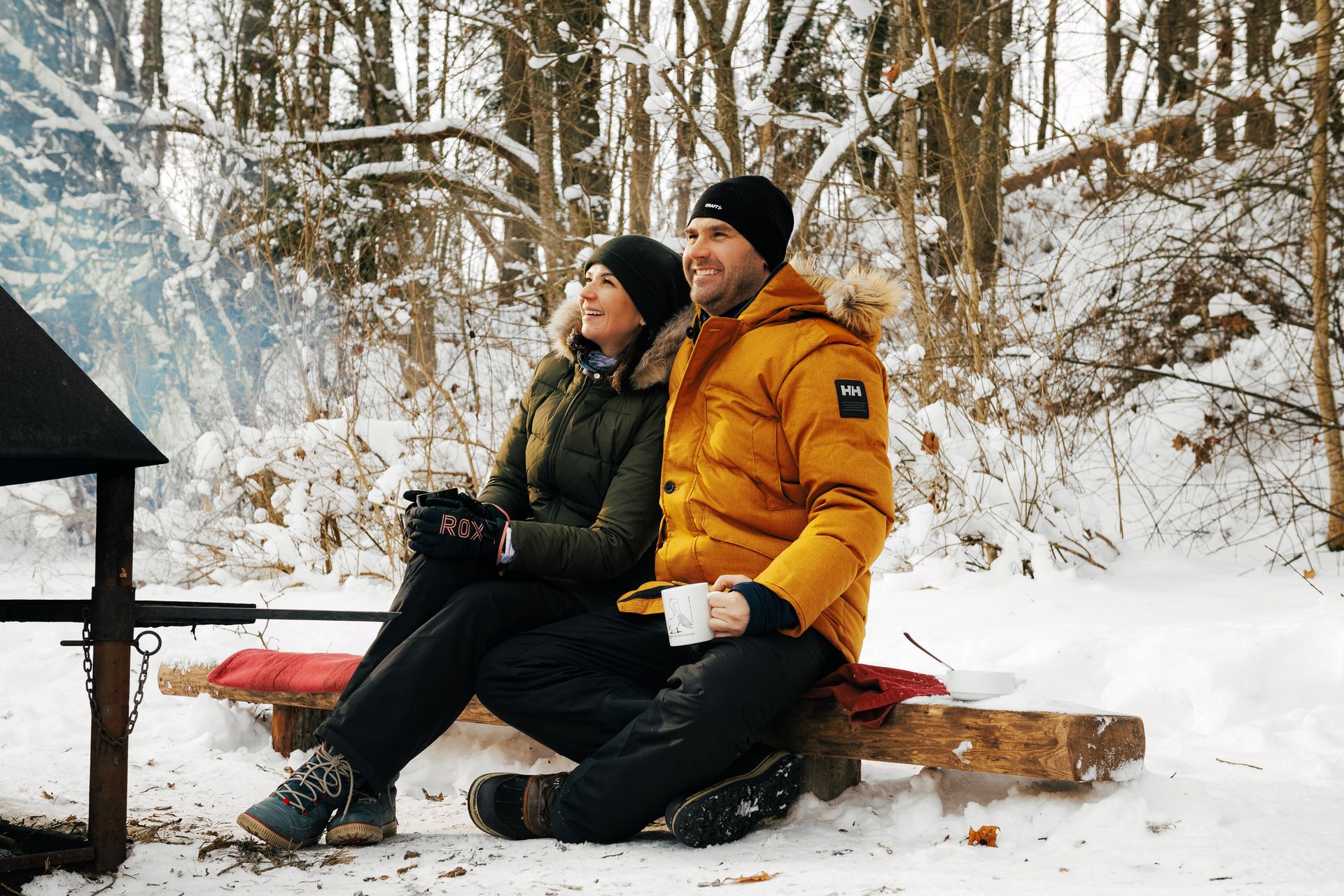 Winter bonfire picnic on forest hiking trail